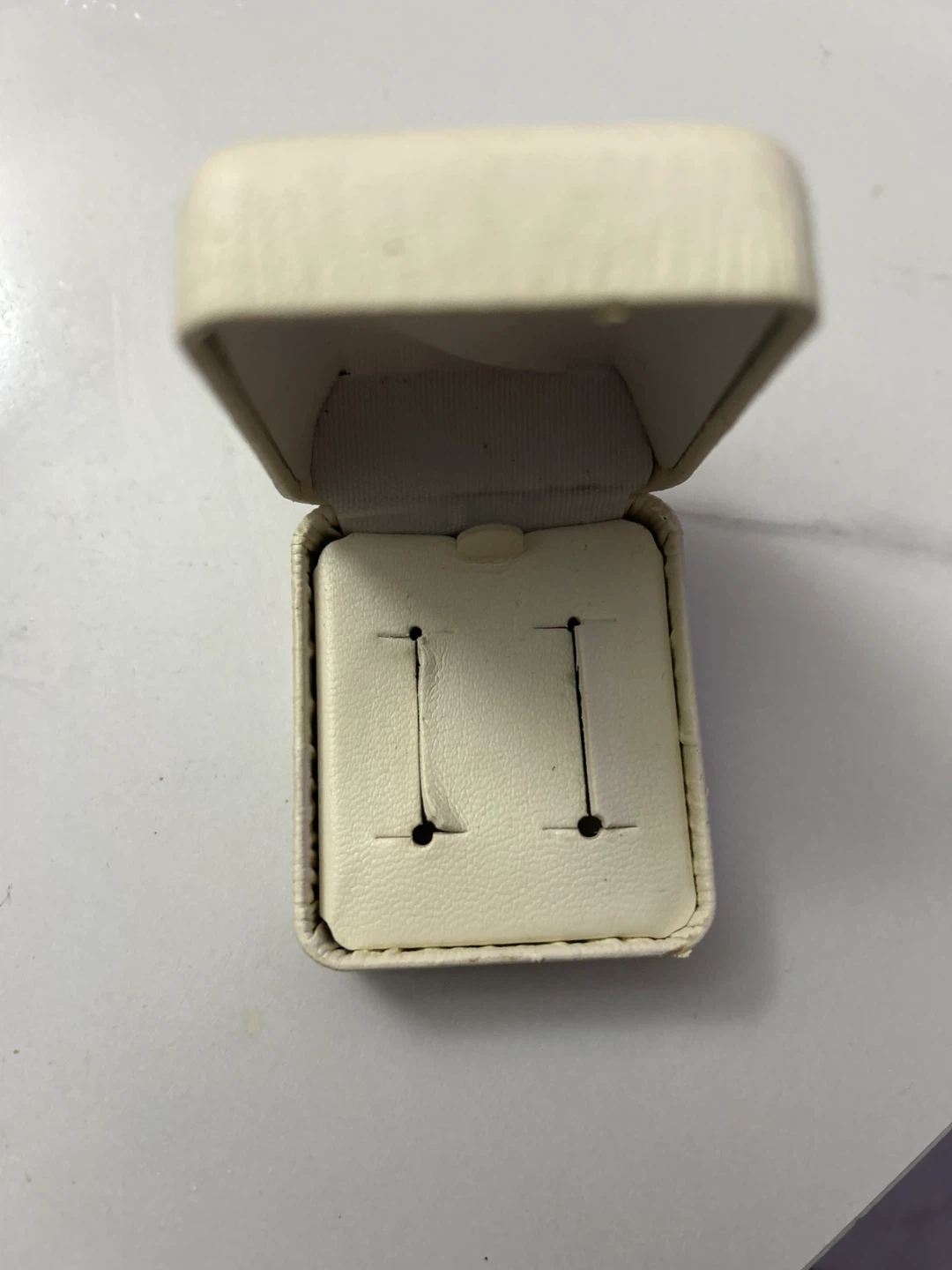 Cream coloured jewellery box for earrings