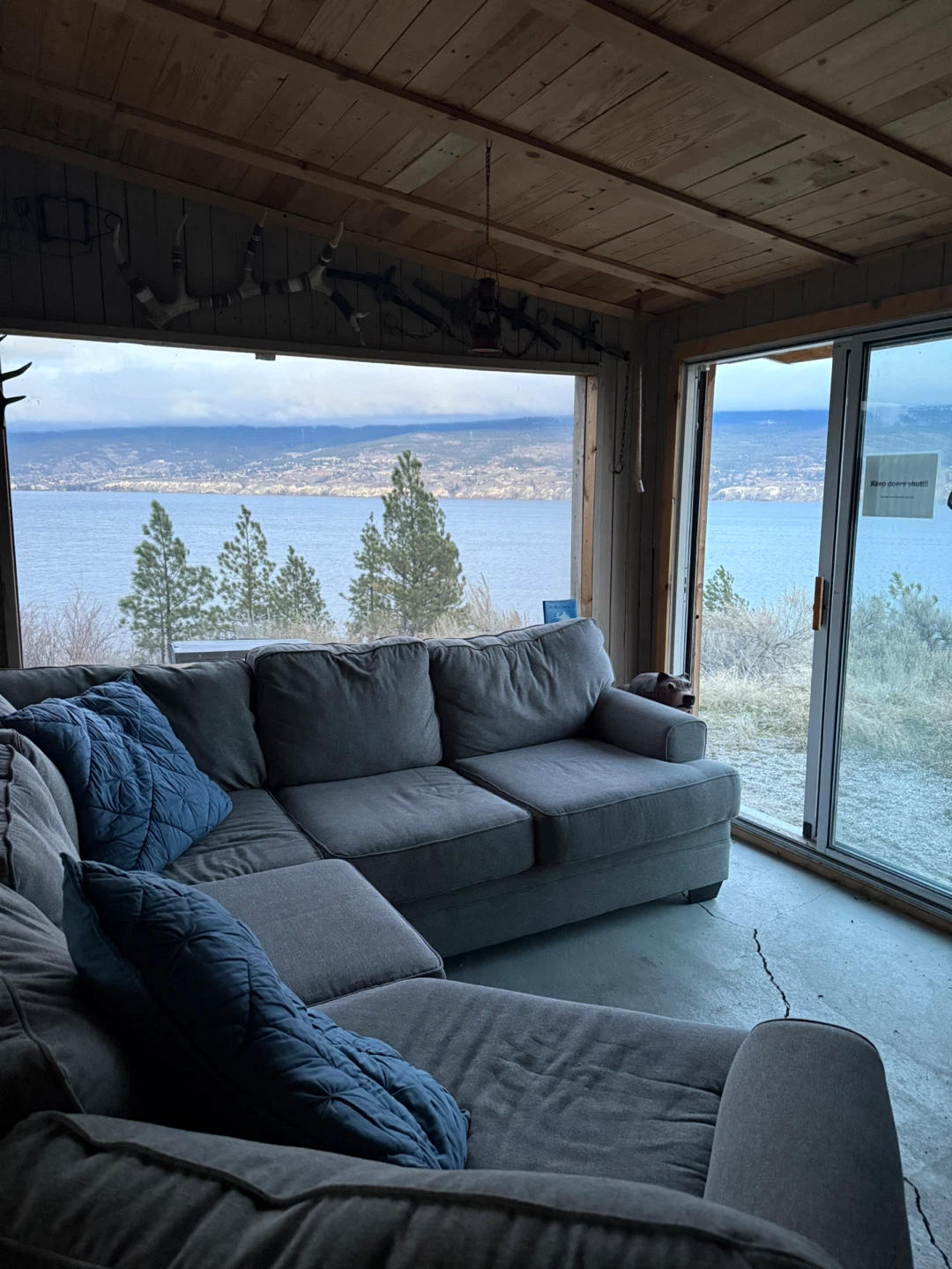 Grey Sectional Couch with Blue Accent Pillows - photo 2