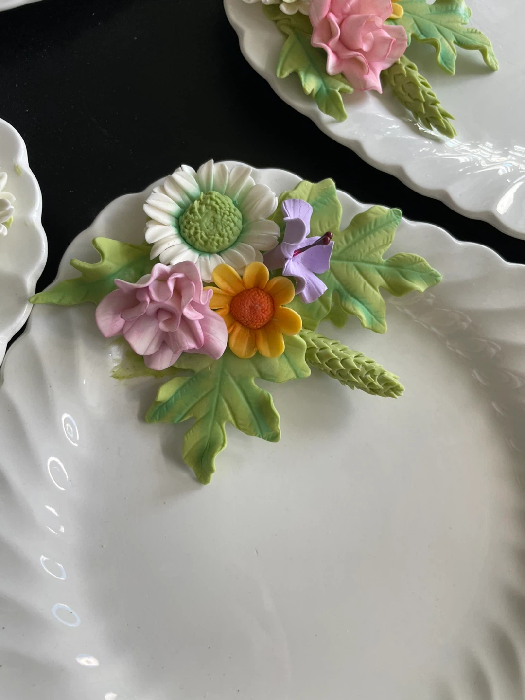 Decorative White Plates with Floral Embellishments