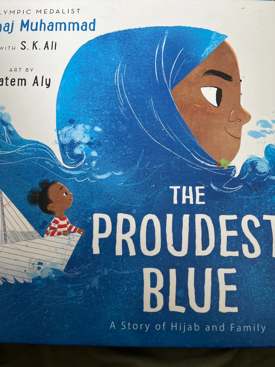 The Proudest Blue:  by Ibtihaj Muhammad
