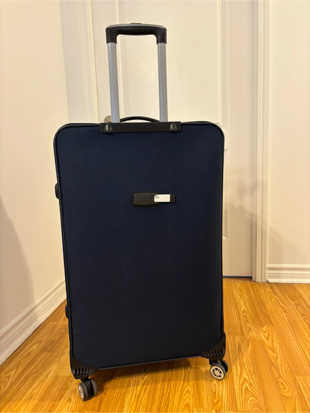 Travelpro Navy Blue Suitcase check in - photo 4