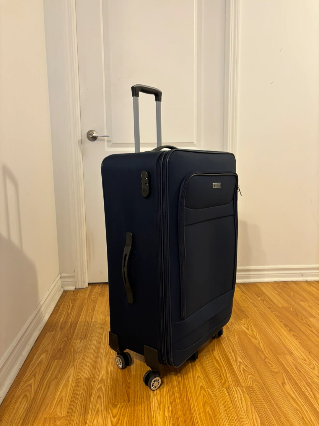 Travelpro Navy Blue Suitcase check in - photo 3
