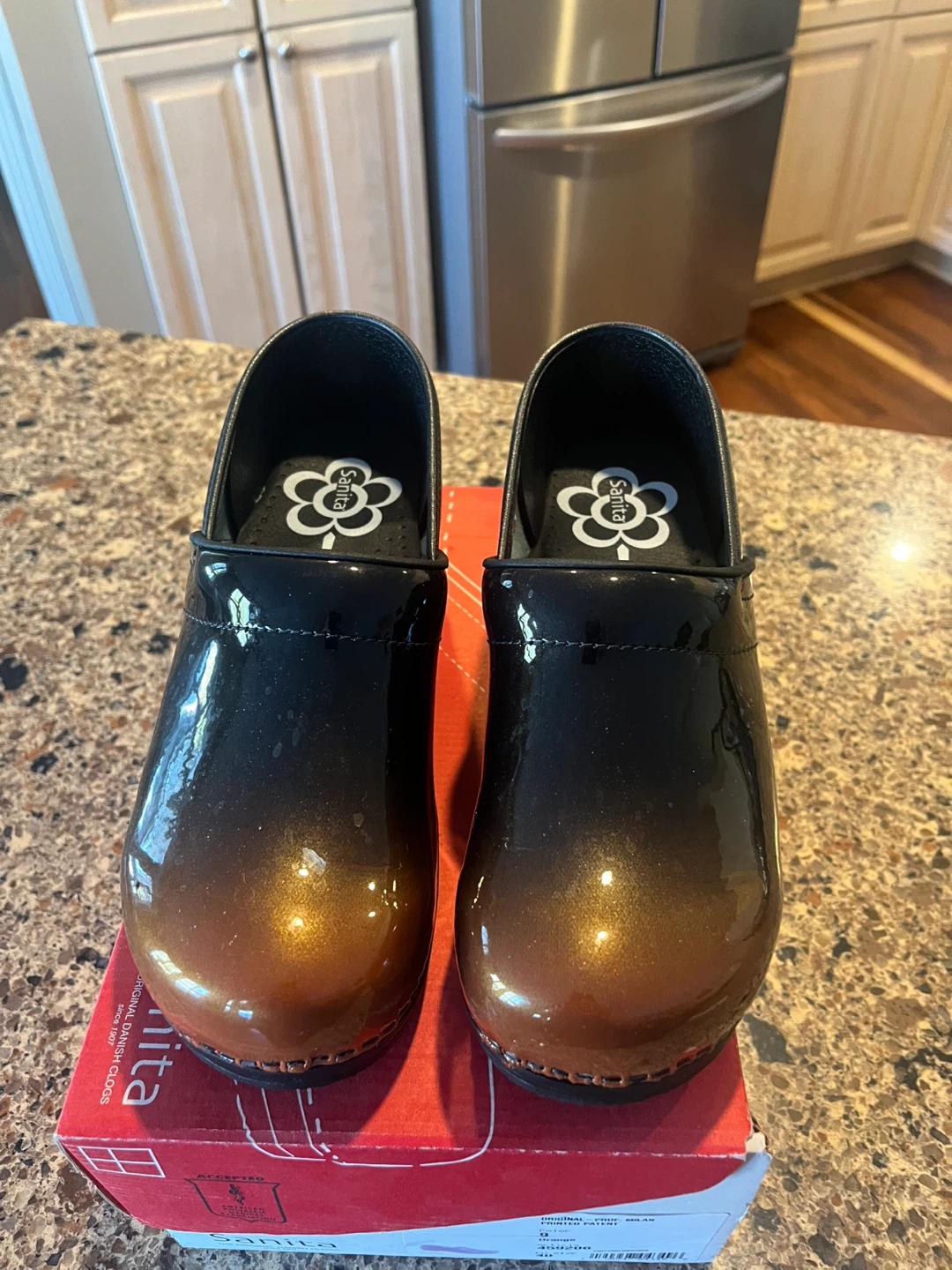 Sanita Black Patent Clogs