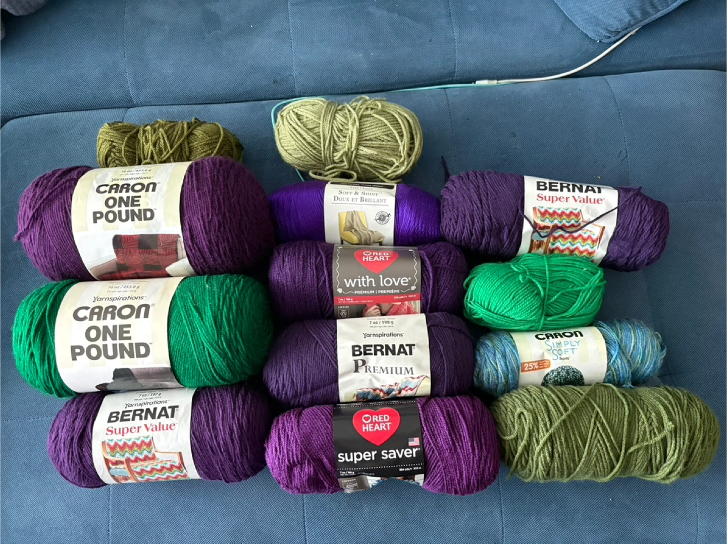 Purple and green yarn (plus a blue!)