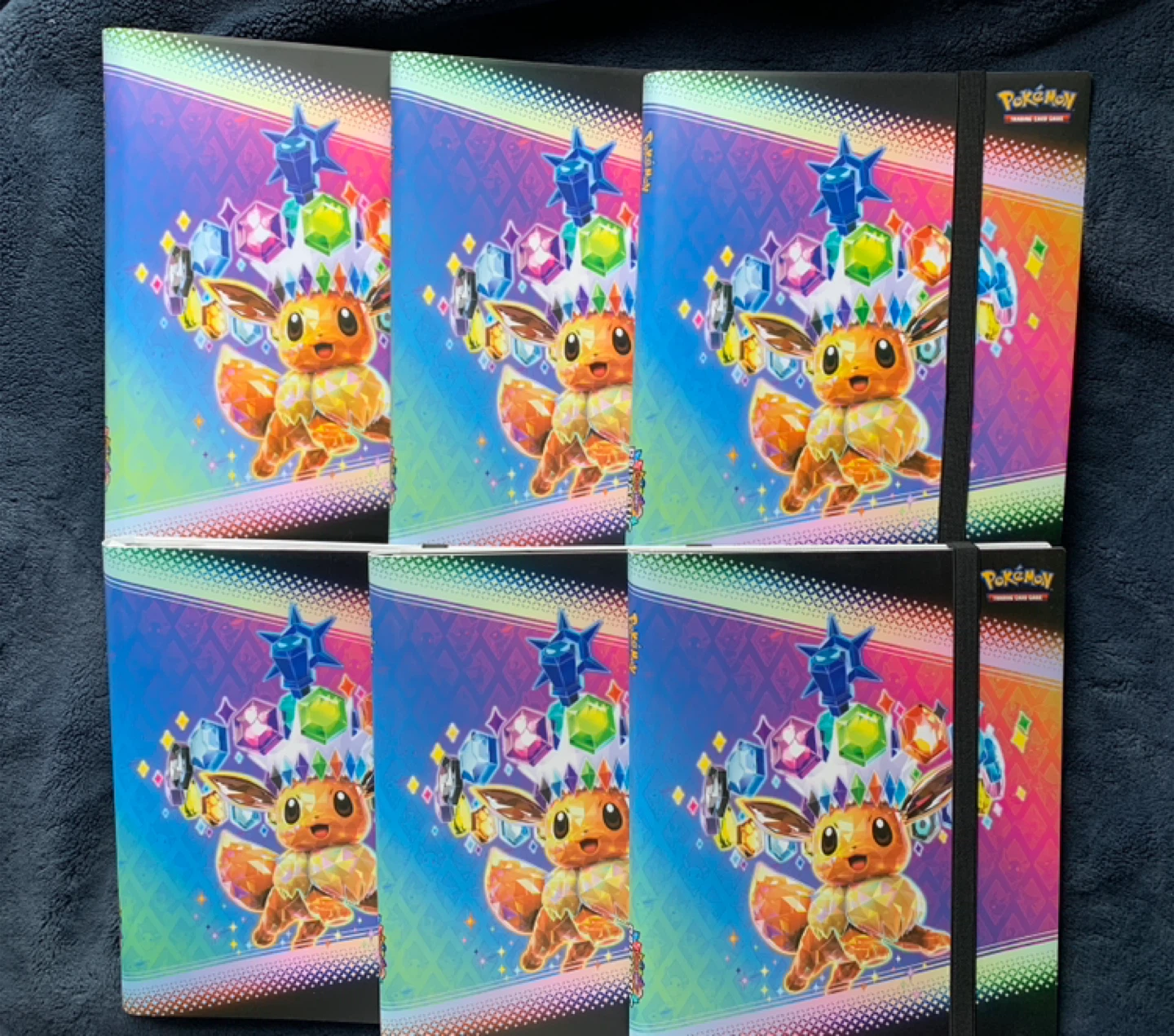 New Eevee Prismatic Evolutions Pokemon Binder (One Unit)