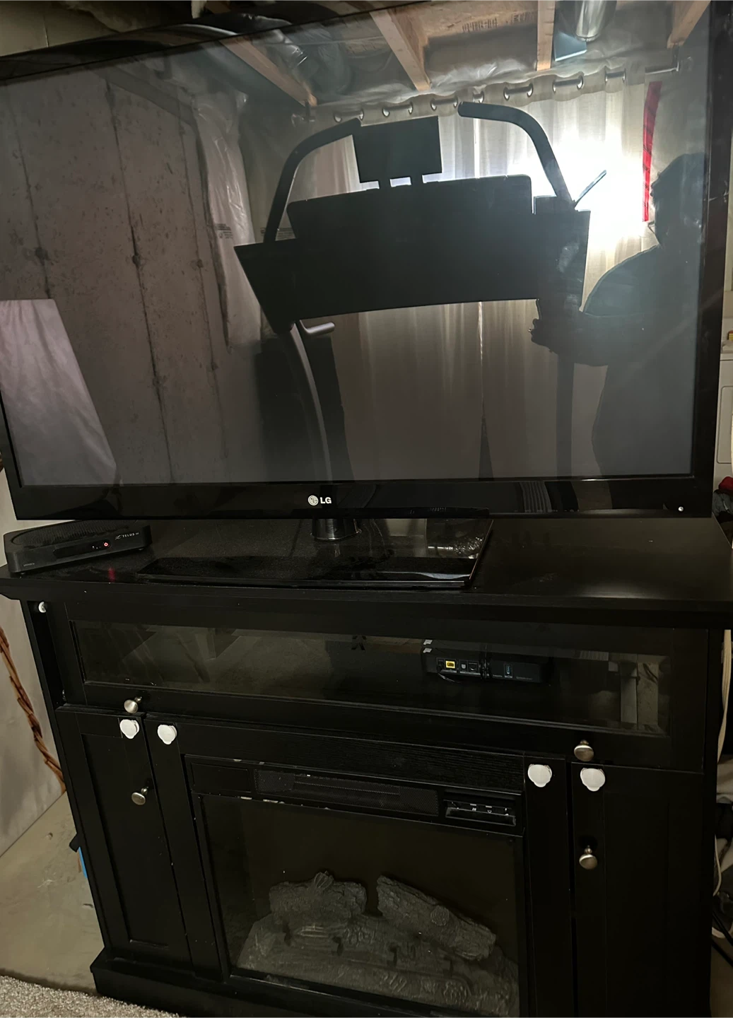 LG Television with Media Console and Electric Fireplace