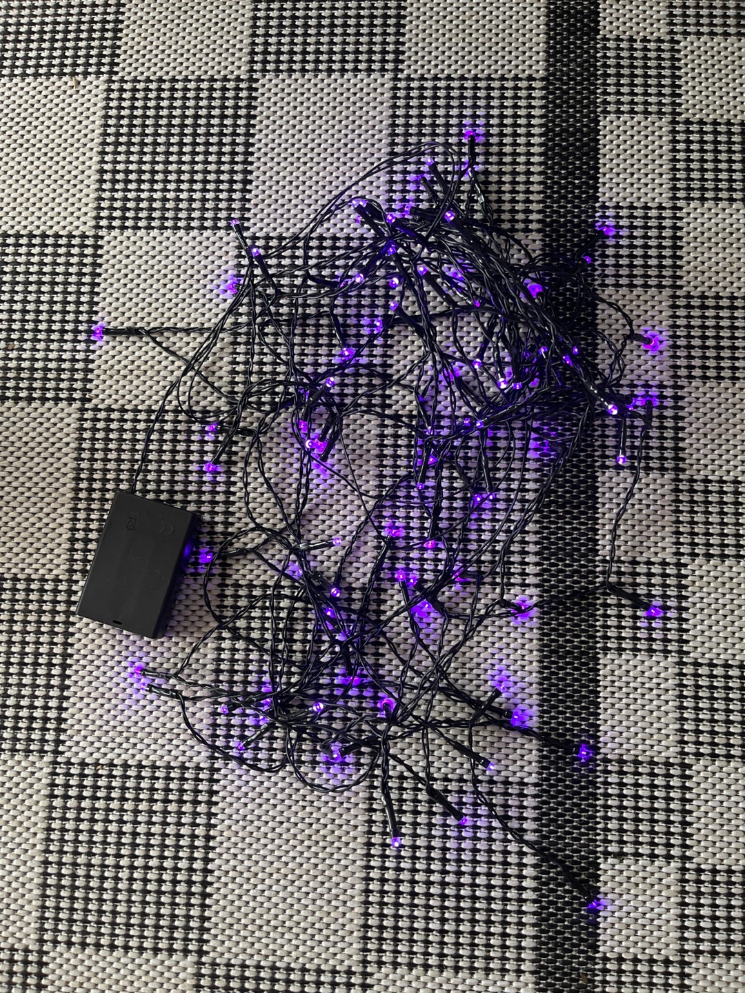 Purple curtain string lights