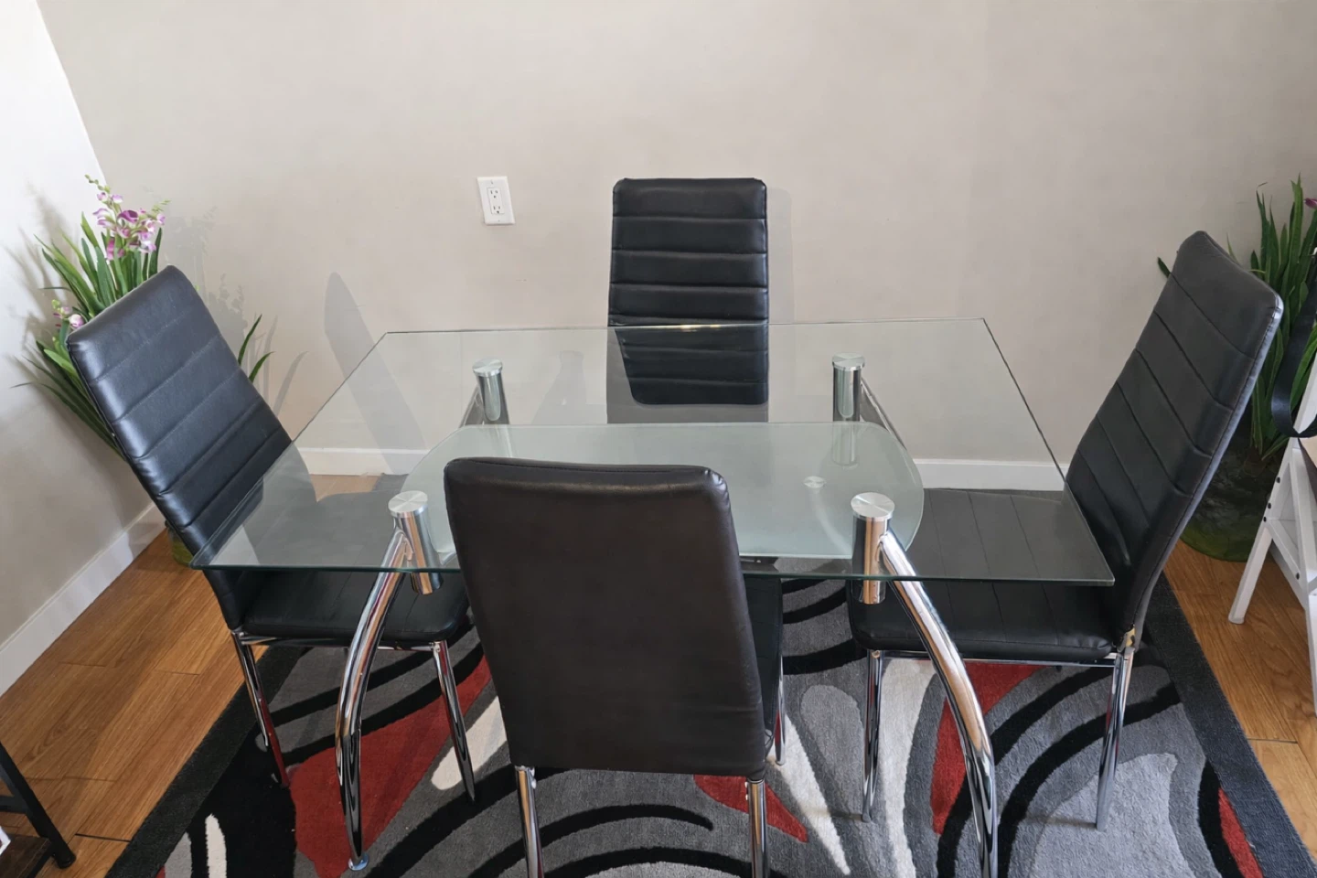 Glass Top Dining Table with 4 Black Chairs