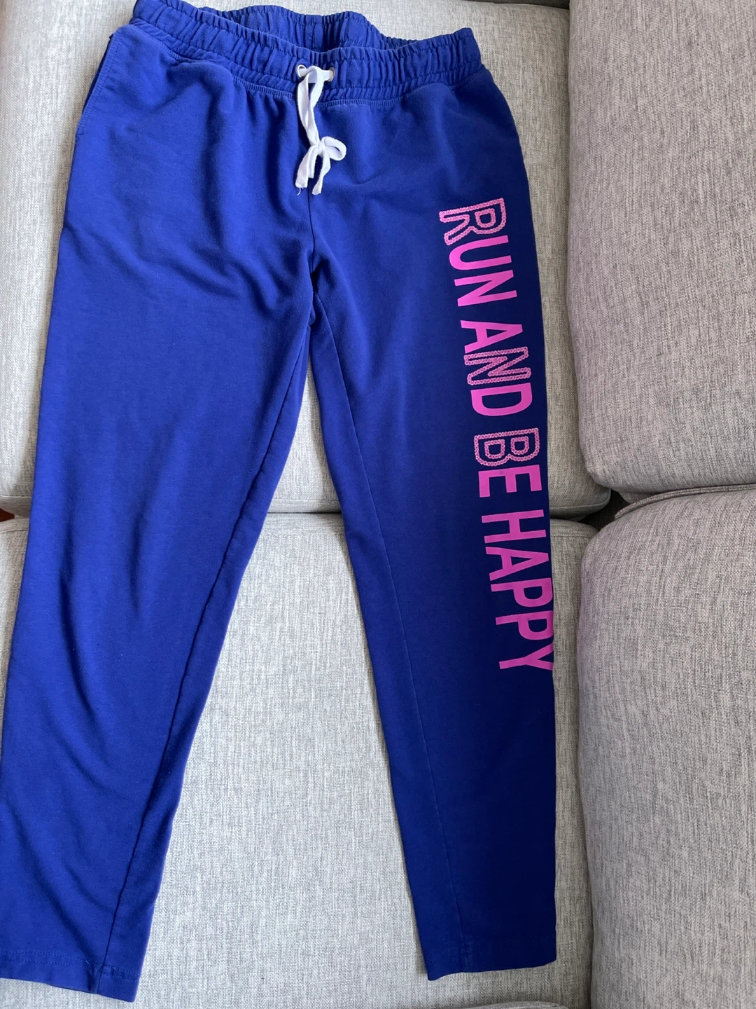 Blue Sweatpants with "Run and Be Happy" Graphic