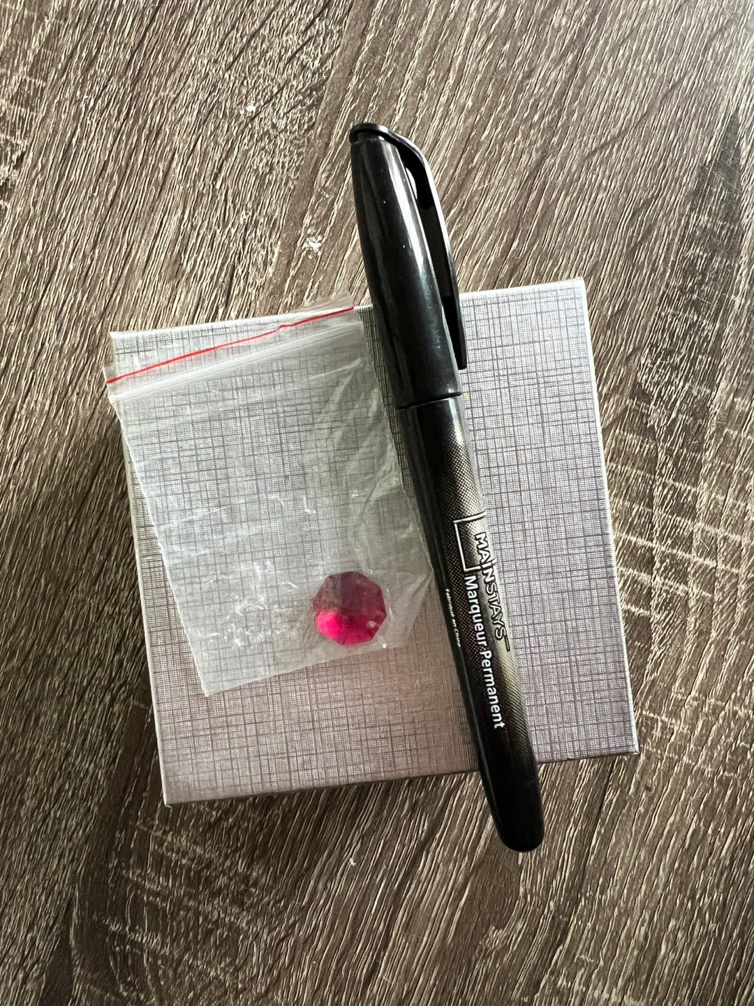 Small red crystal