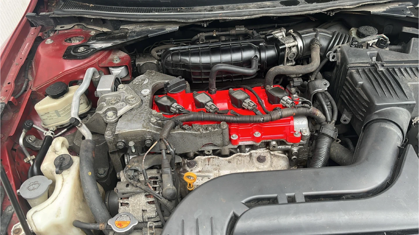 Red Nissan Altima Sedan