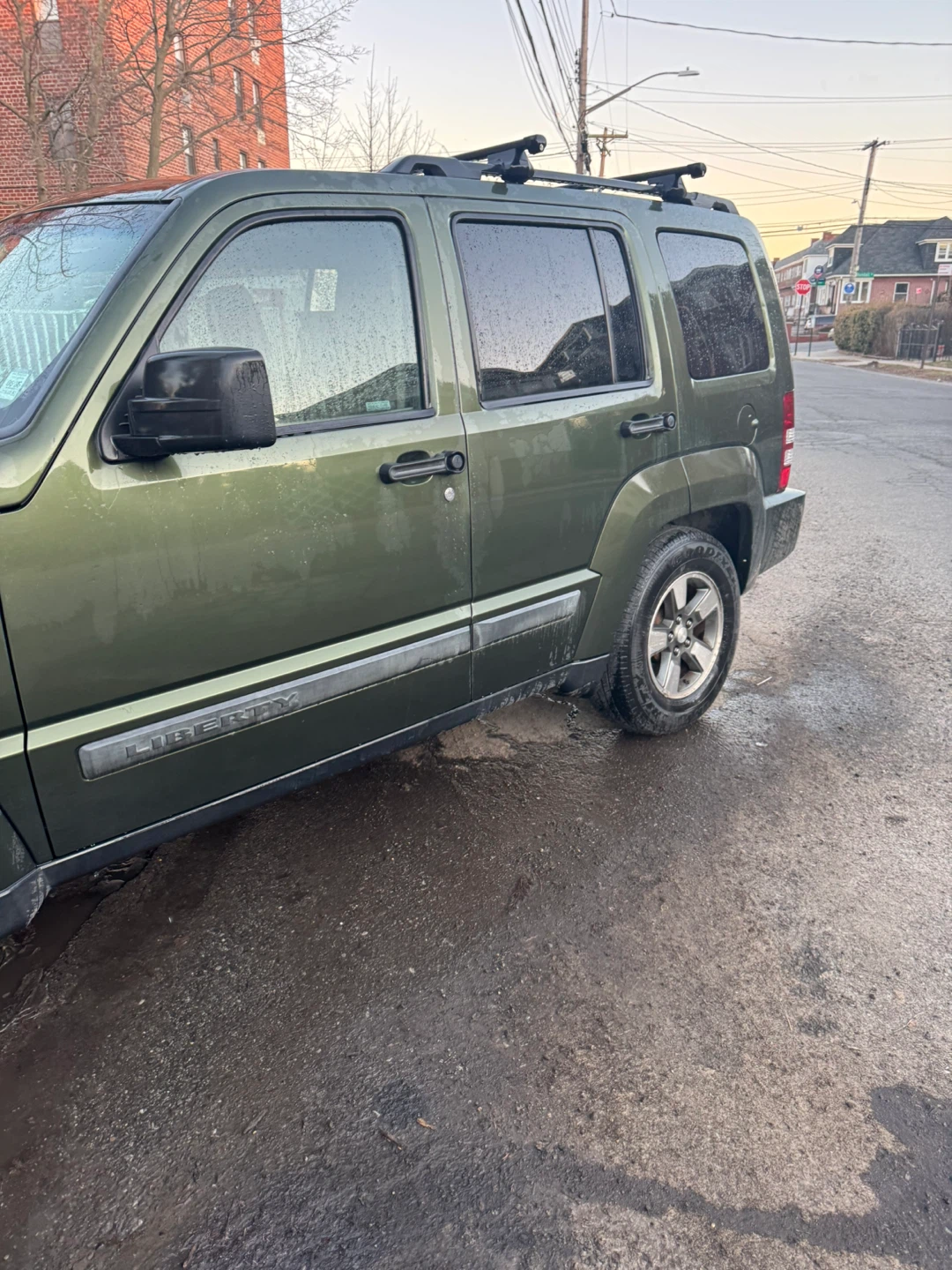 Green Jeep Liberty SUV - photo 3