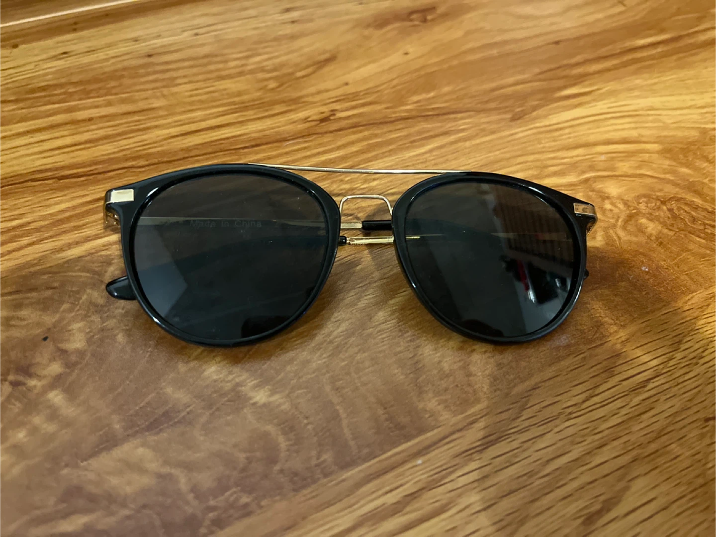 Black Sunglasses with Gold Accents