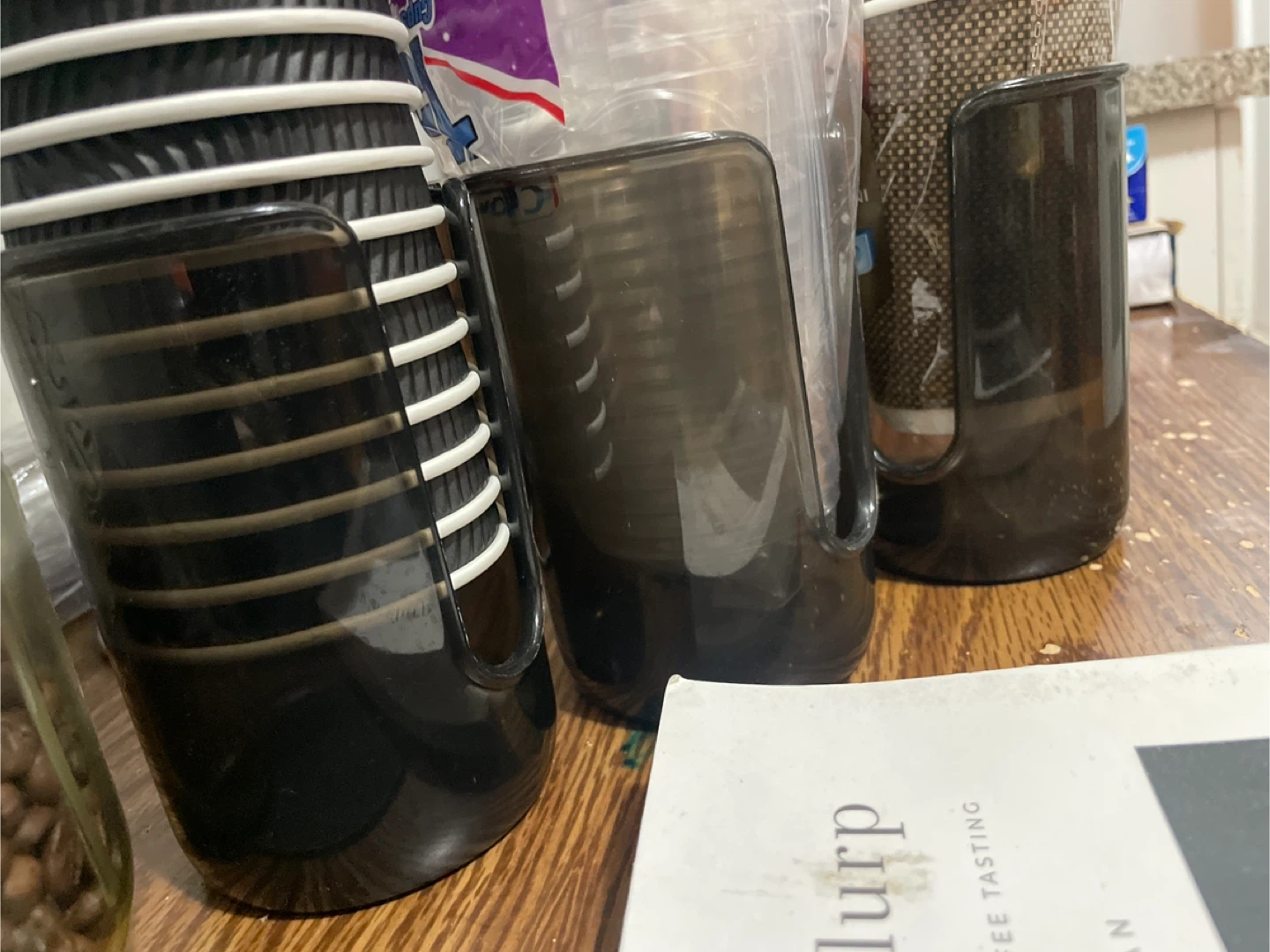 Stack of Black Disposable Cups