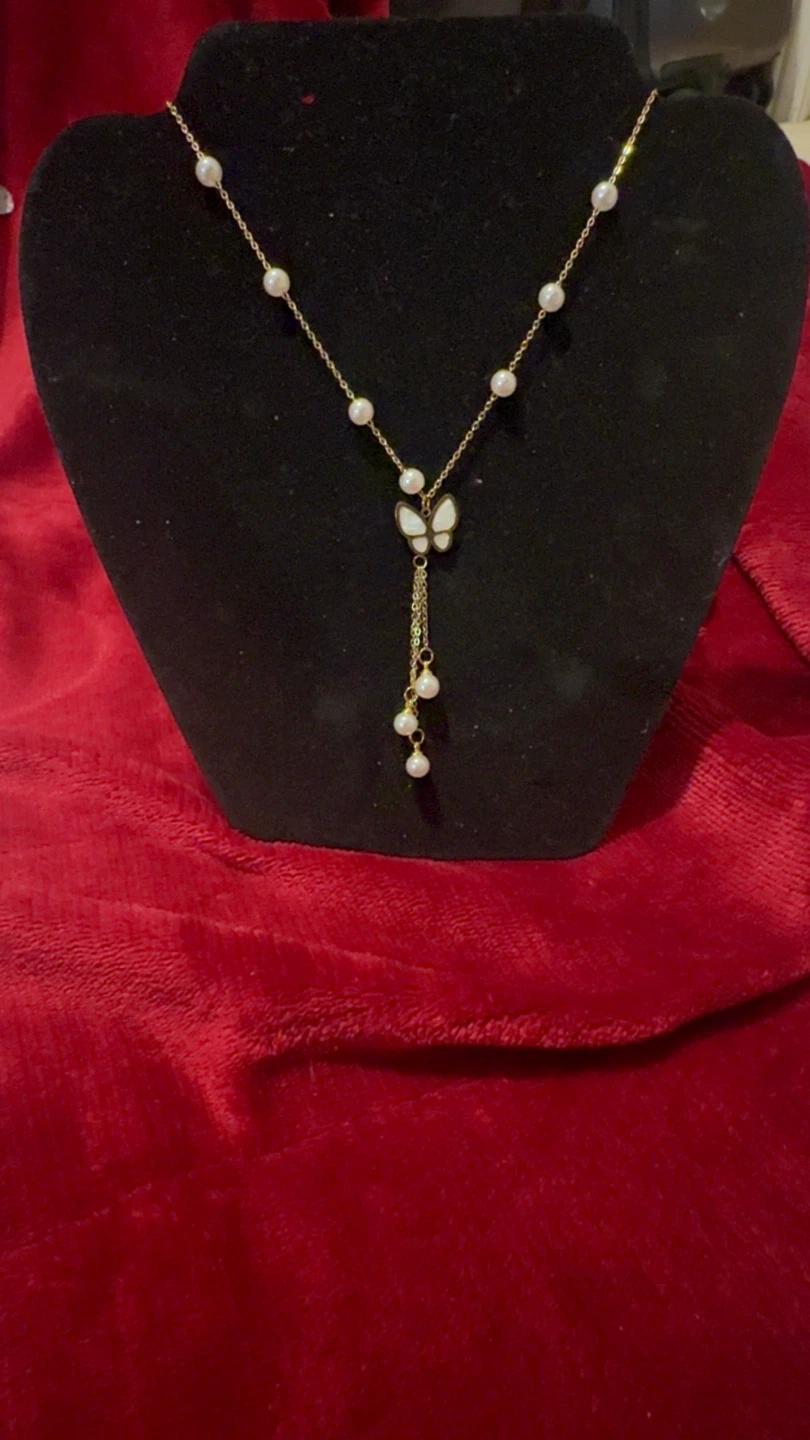 Gold-tone butterfly and pearl necklace
