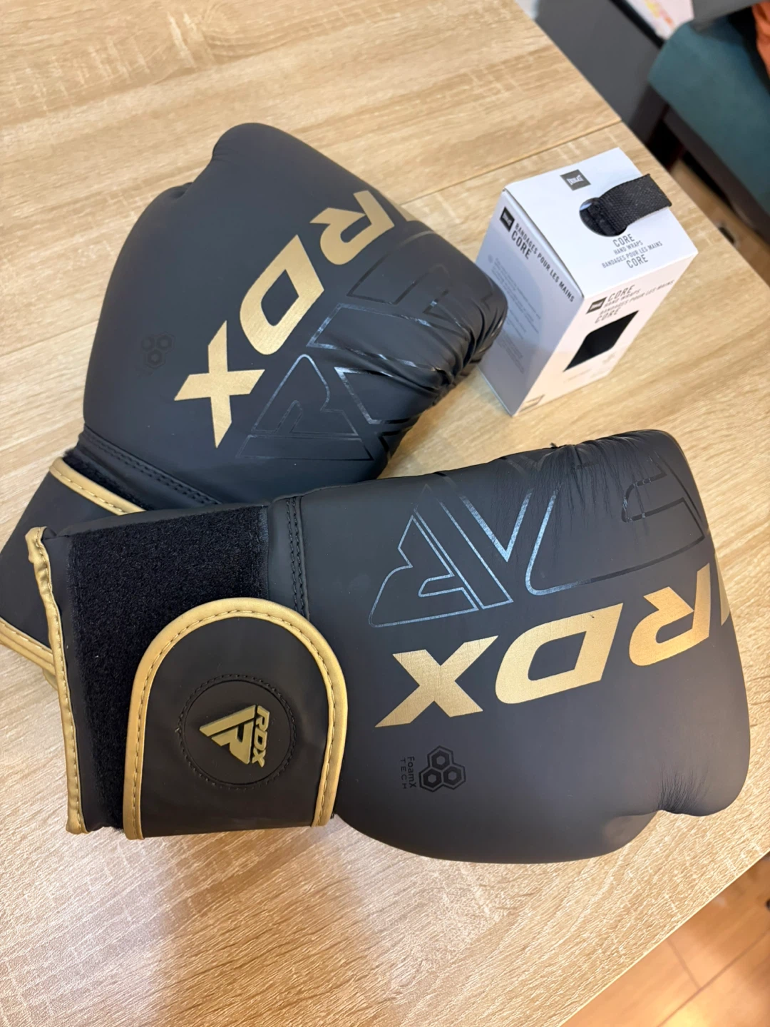 RDX Black and Gold Boxing Gloves with Wraps