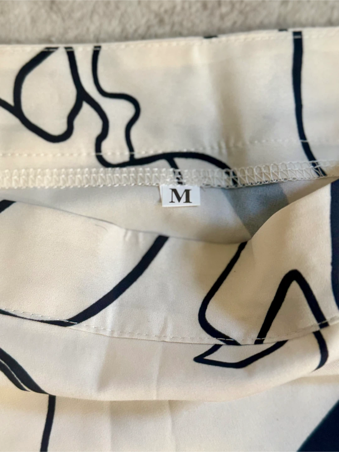 🥕Cream and Black Abstract Face Print Midi Skirt - Size M - photo 2
