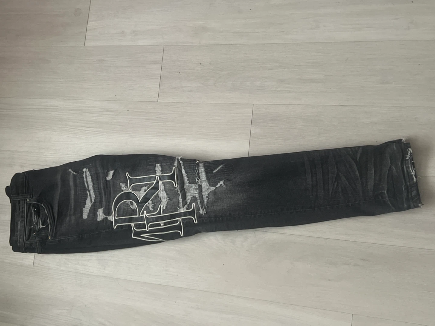 AMIRI Black Distressed Logo Jeans Size 32