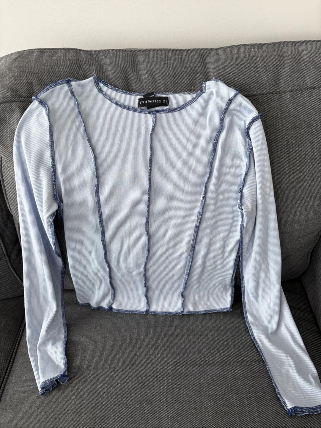 Light blue top
