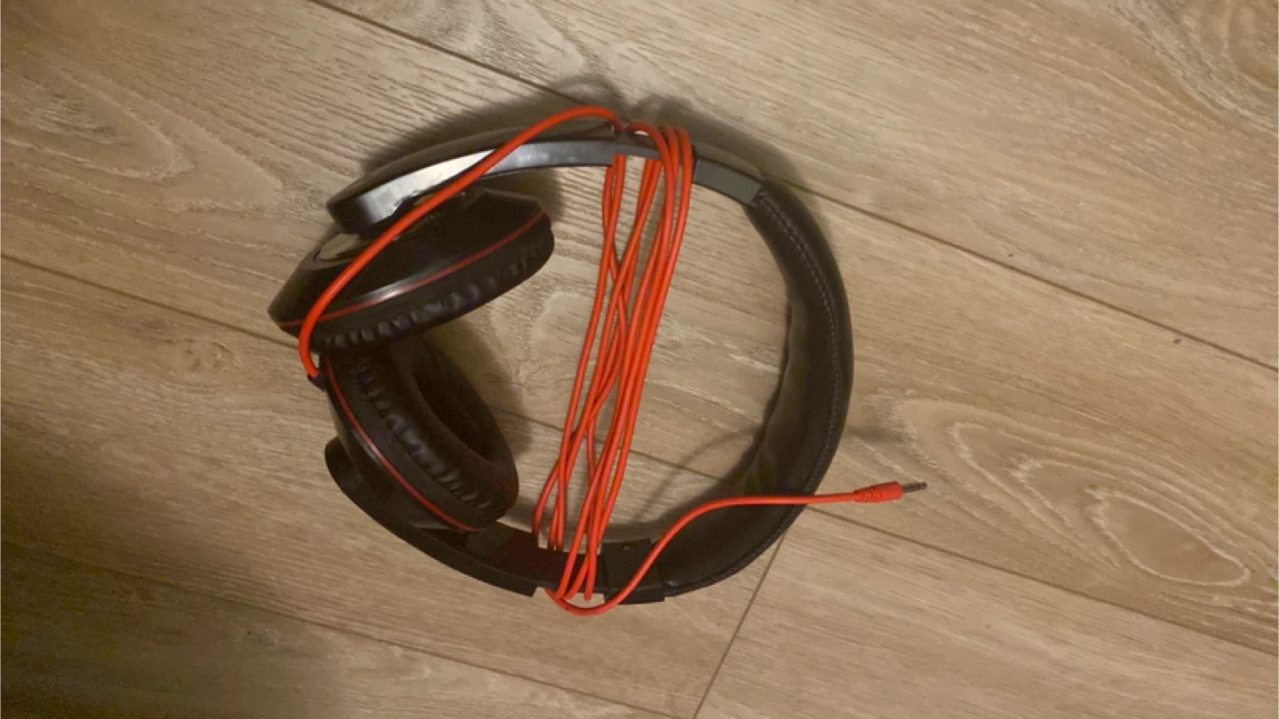 Black and Red Over-Ear Headphones with Orange Cord