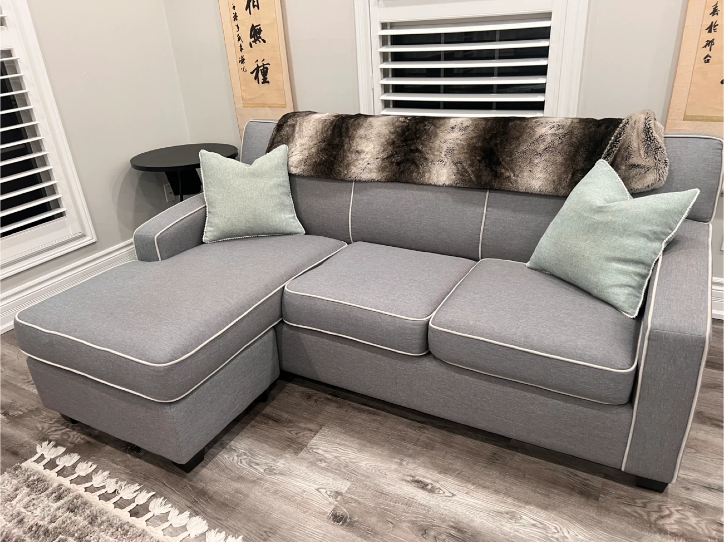 Grey Sectional Sofa with a Chaise and Pull-out Bed