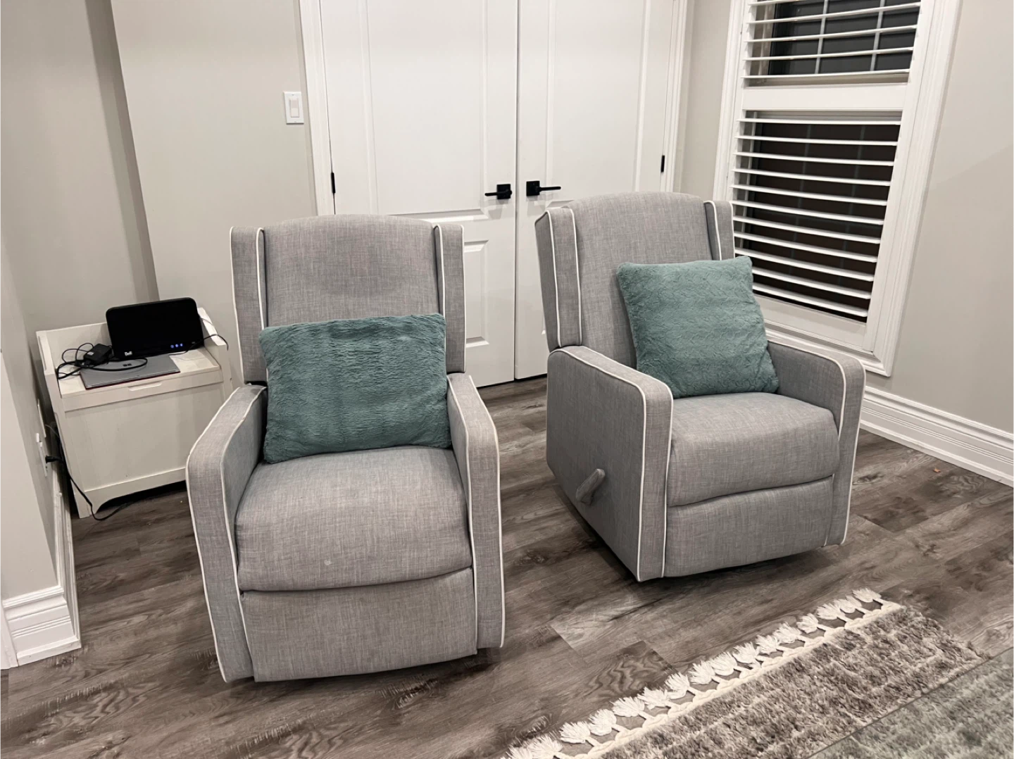 Pair of Grey Glider Recliners with Teal Pillows