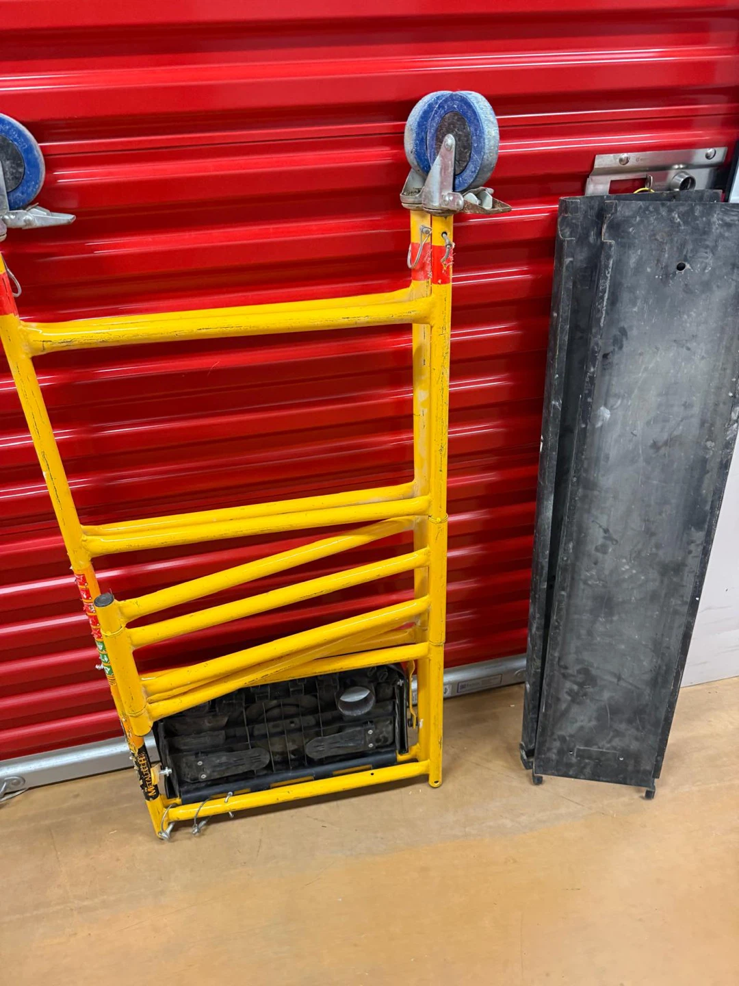 Yellow Rolling Scaffolding with Black Platform