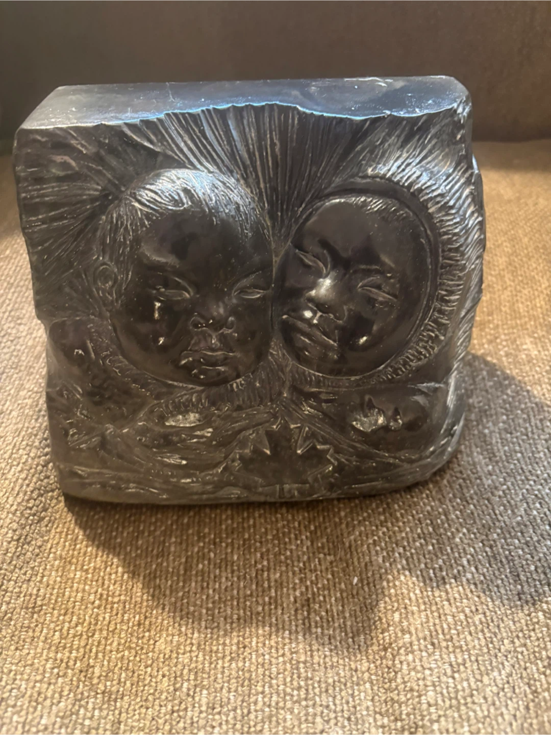 Carved Stone Sculpture of Two Faces