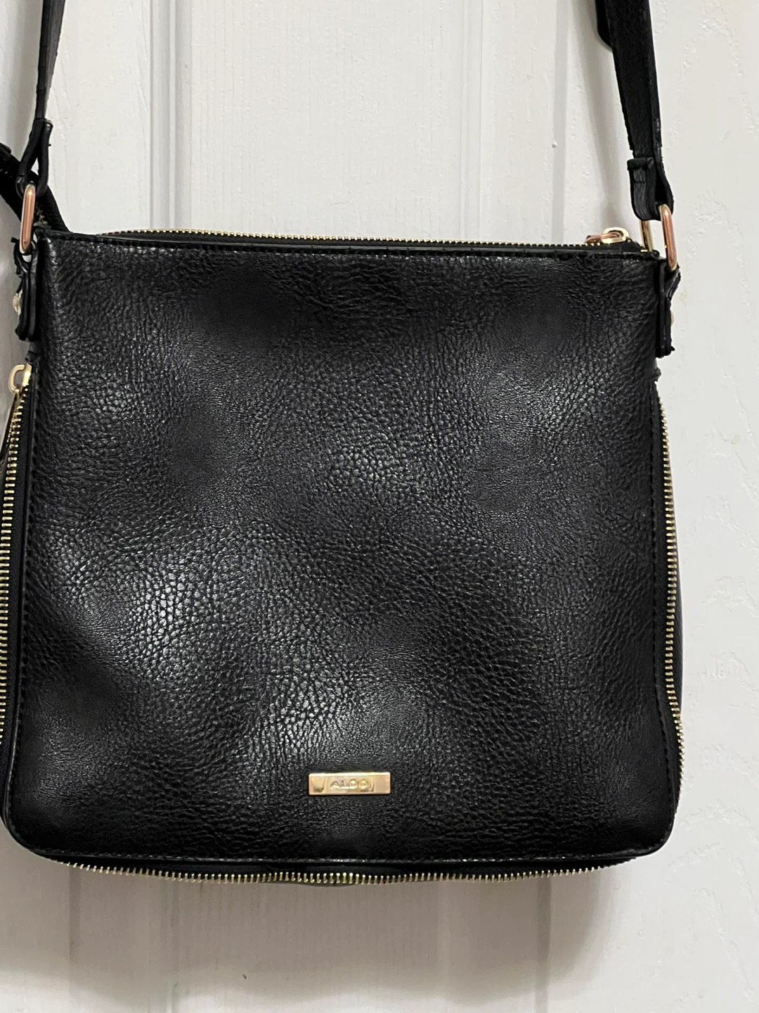 Black Aldo crossbody purse with gold hardware