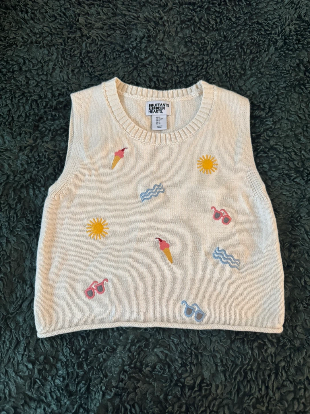 Peekaboo Hearts sleeveless sweater
