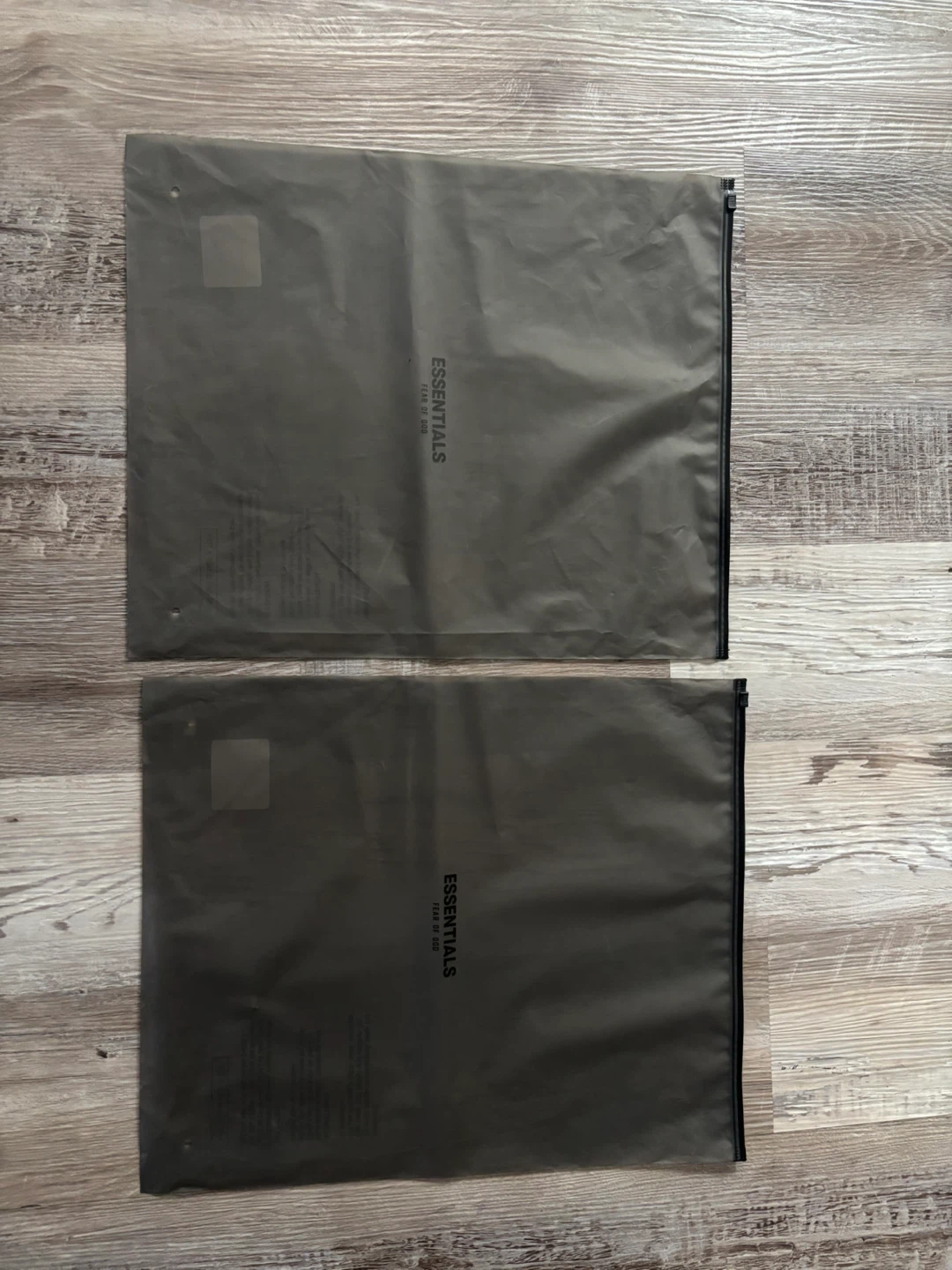 Fear of God Essentials Black Hoodie - photo 4