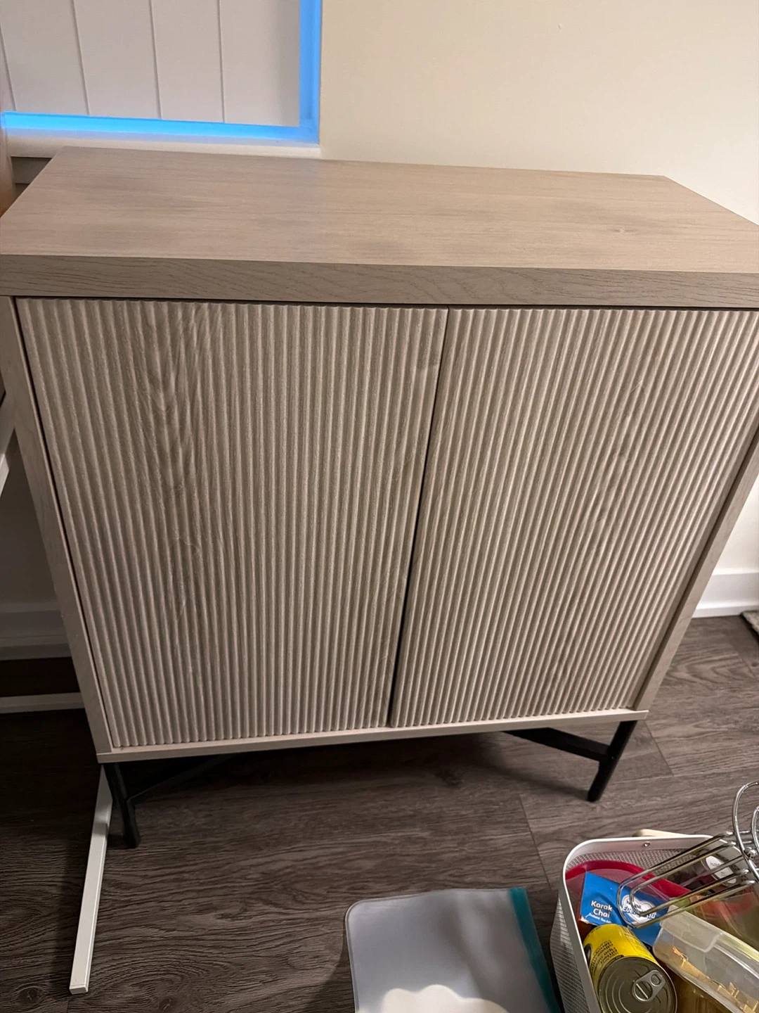 Light Wood Cabinet with Ribbed Doors
