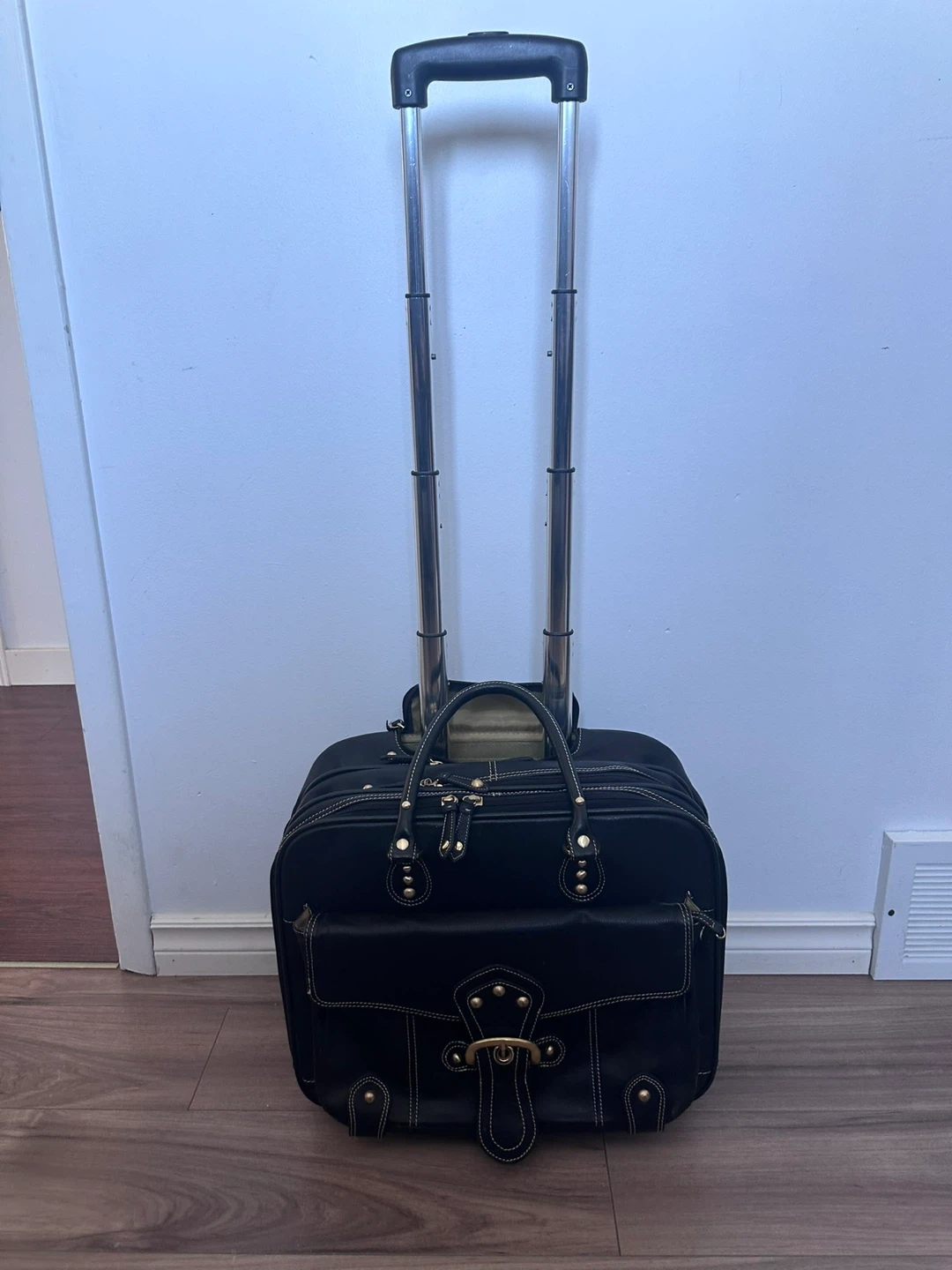 Franklin Covey black leather wheeled carry on travel  bag black