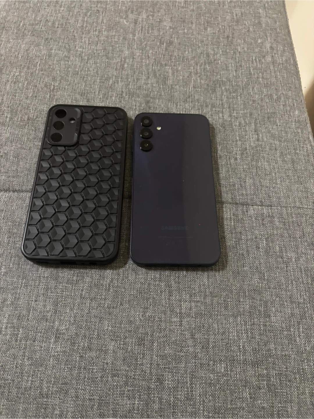 Samsung Phone with Black Honeycomb Case