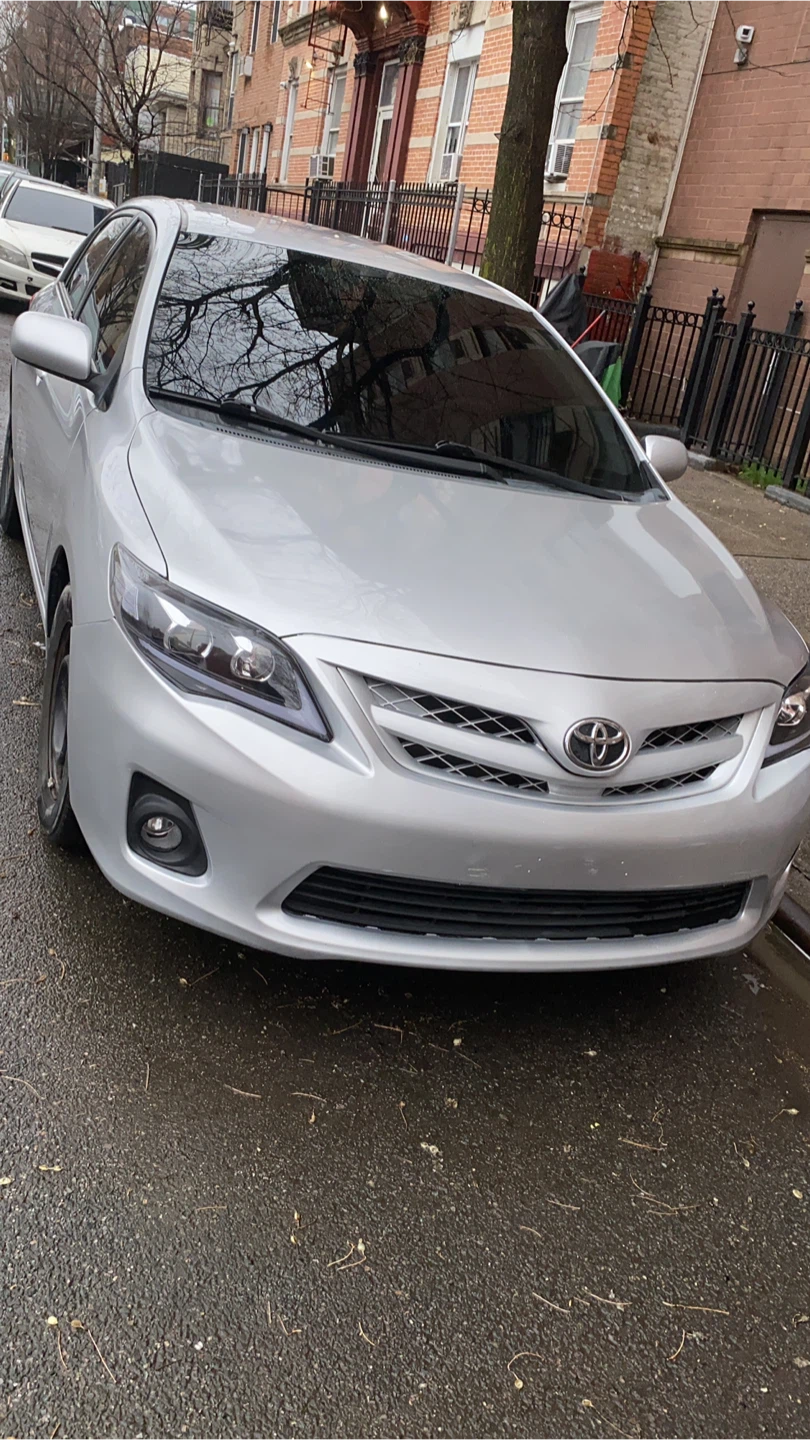 Silver Toyota Corolla Sedan