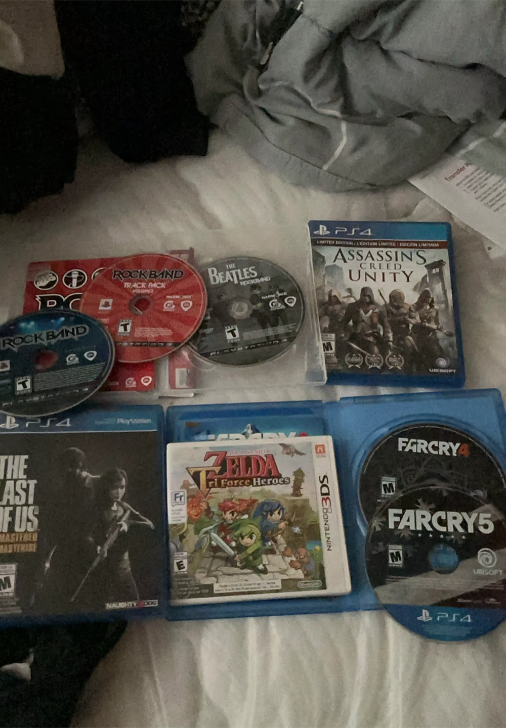 PS4 Video Game Bundle: Assn'sCreedUnity, FarCry 4/5,Last of Us