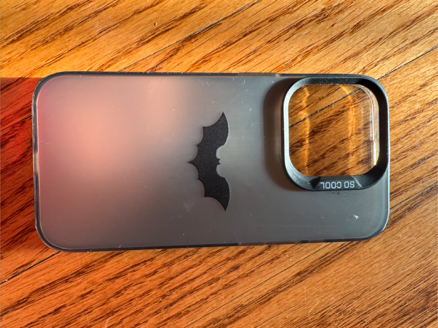 Phone Case with Bat Design and Lens Attachment