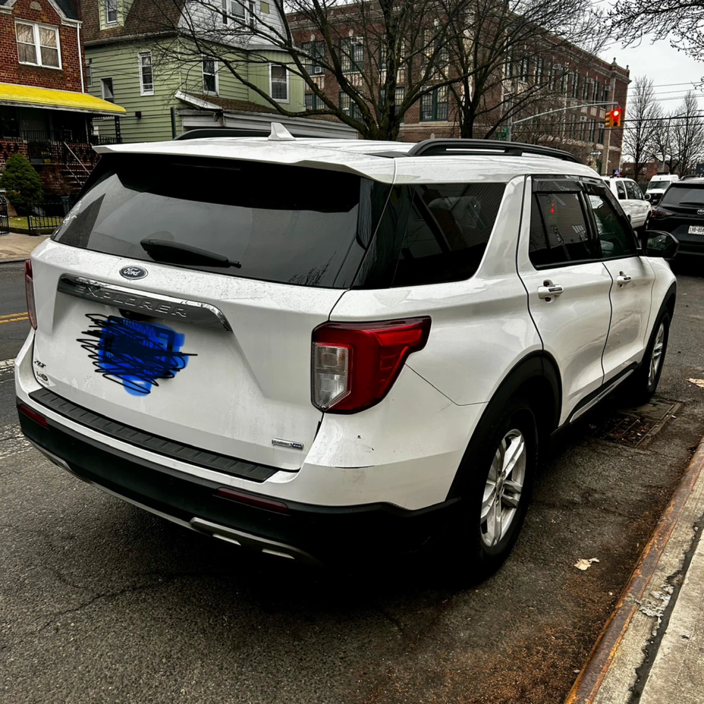 White Ford Explorer SUV