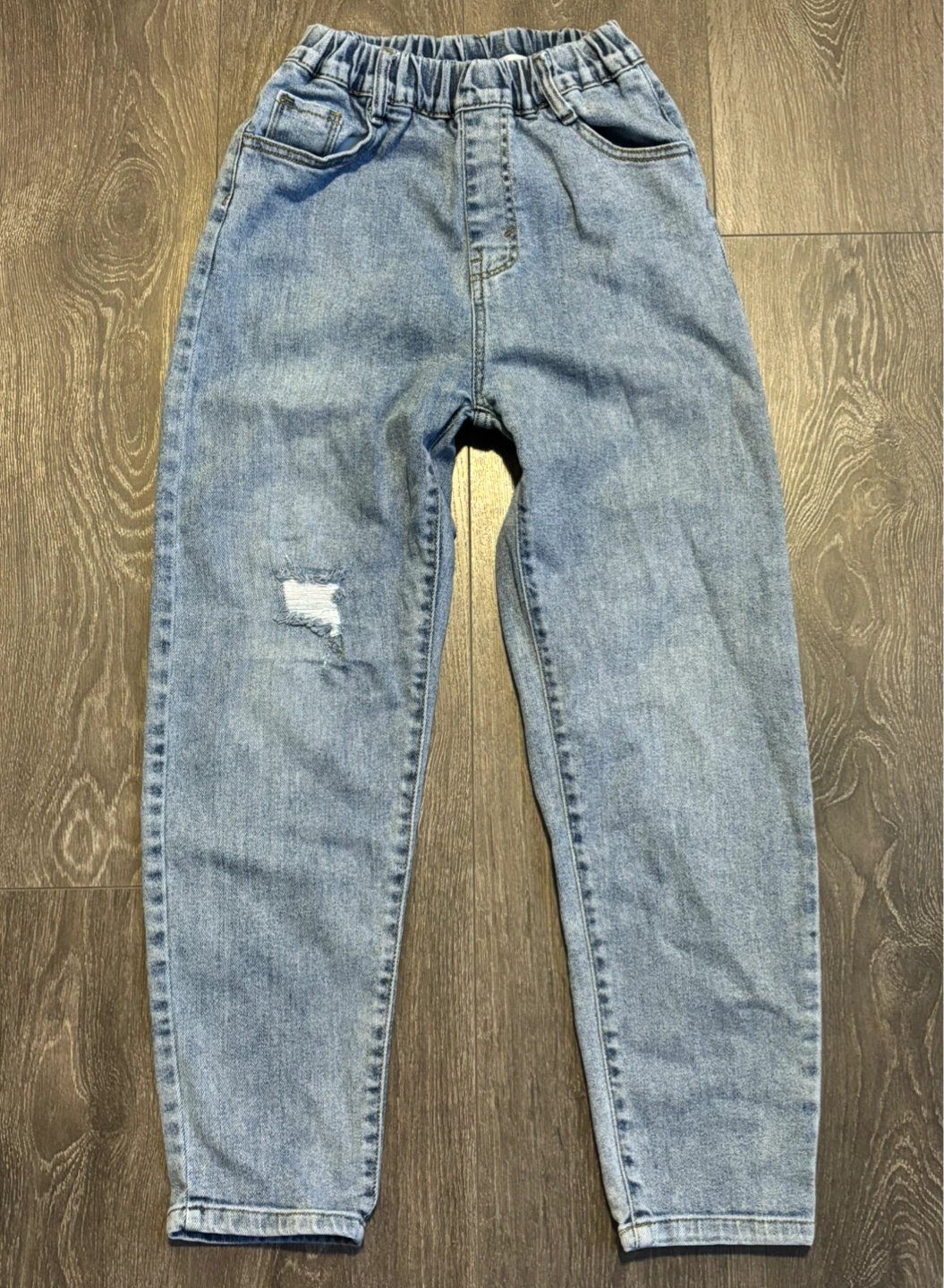high rise blue wash tapered jeans