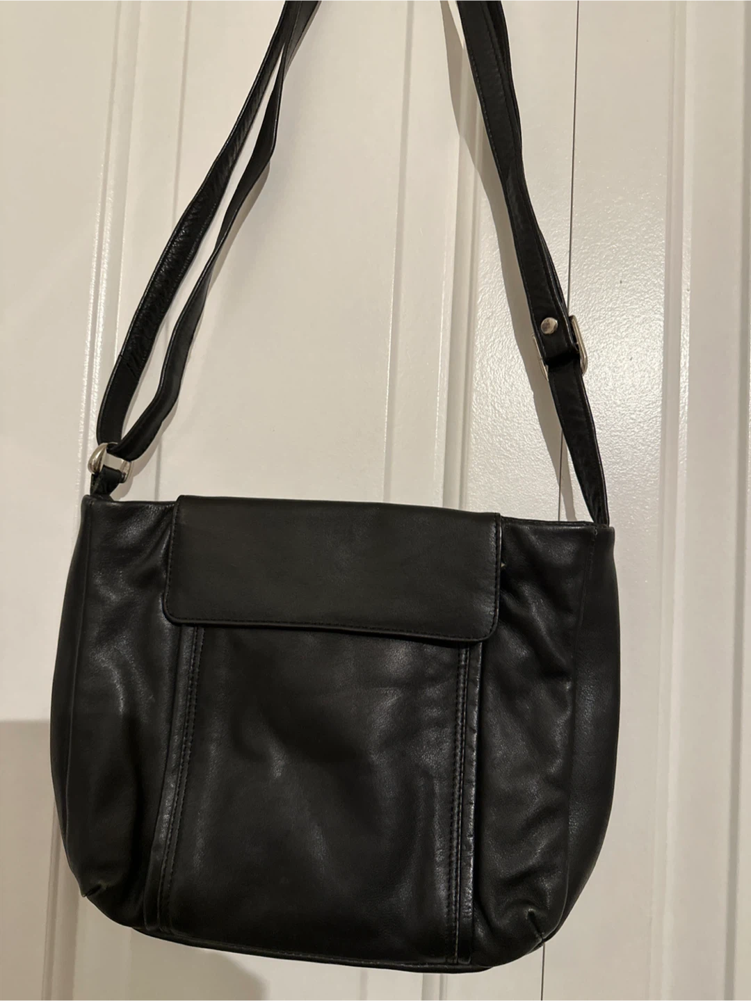 Soft black leather purse with shoulder straps