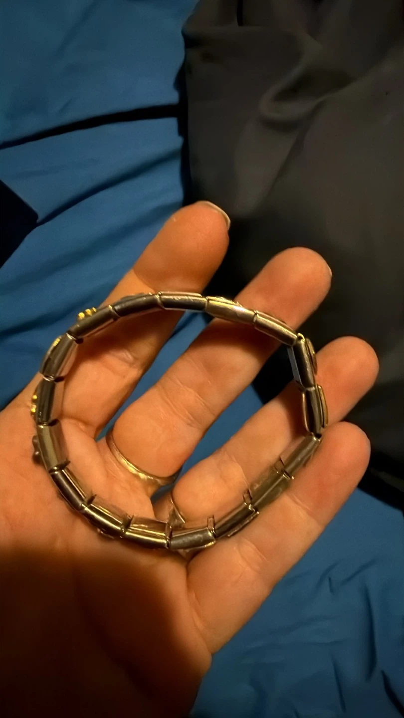 Silver Tone Stretch Bracelet with Gold Accents