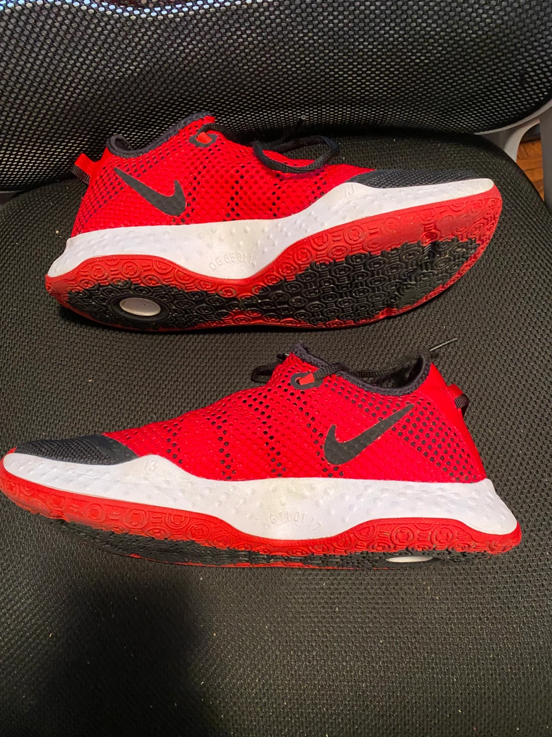 Like new red,black and grey Nike air shoes