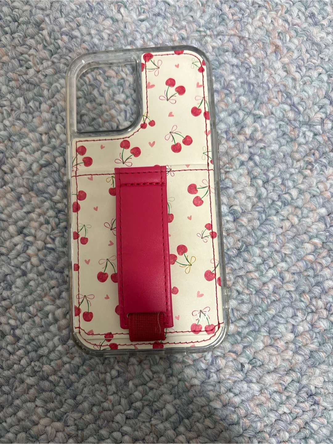 Cherry pattern phone case with pink grip strap