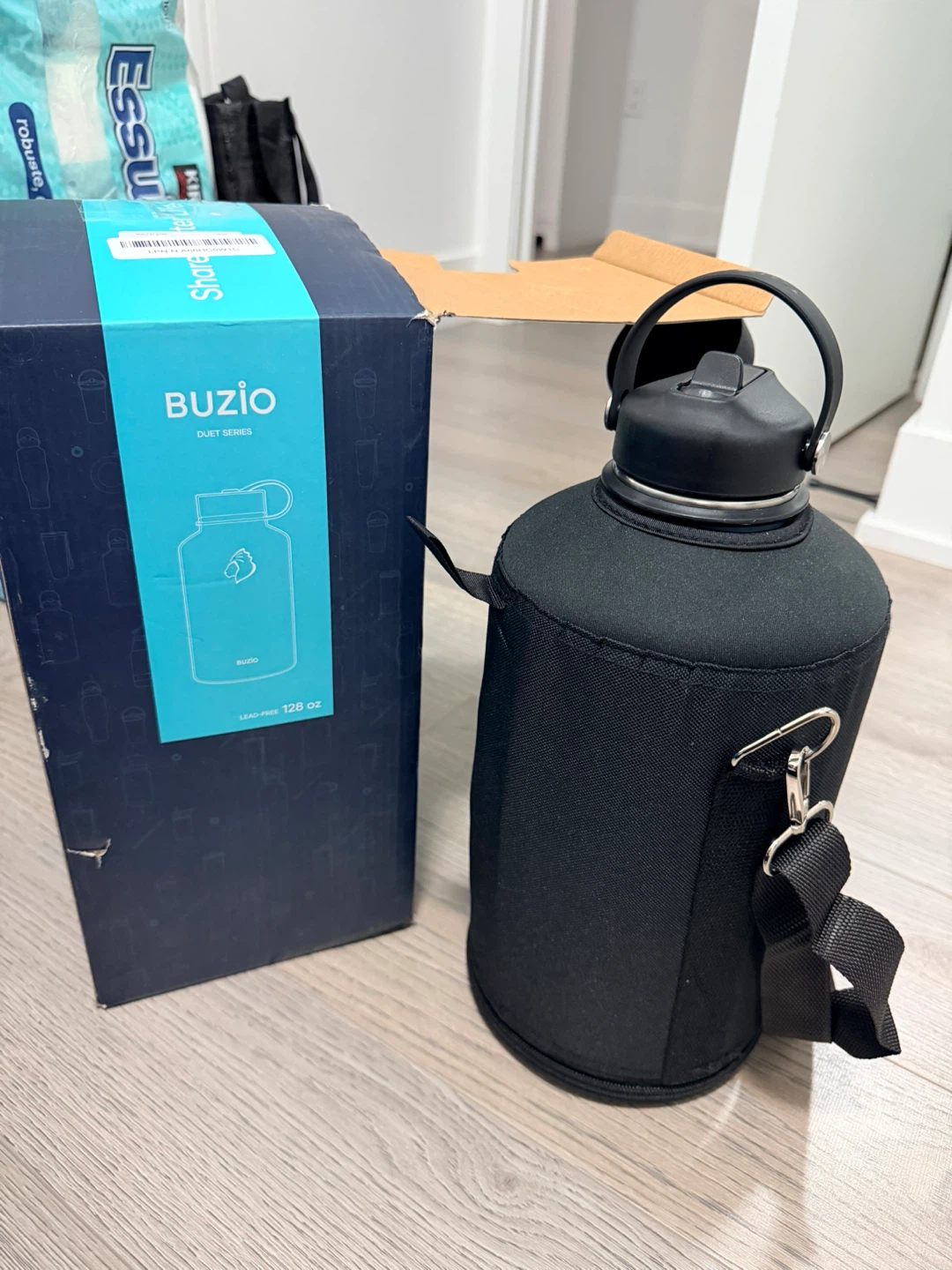 BUZIO 128 oz Water Bottle with Straw Lid & Flex Cap
