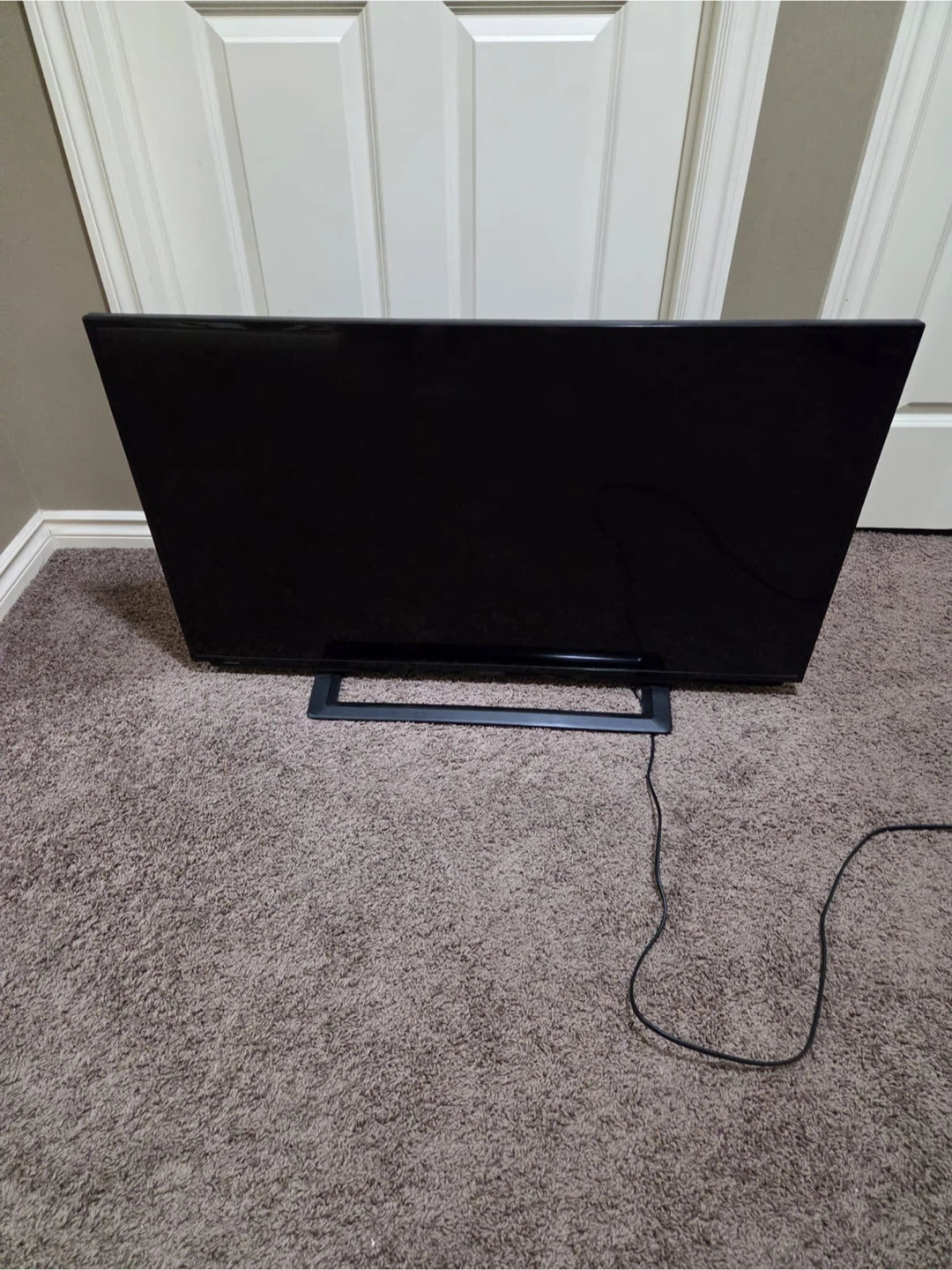 Black flat screen TV