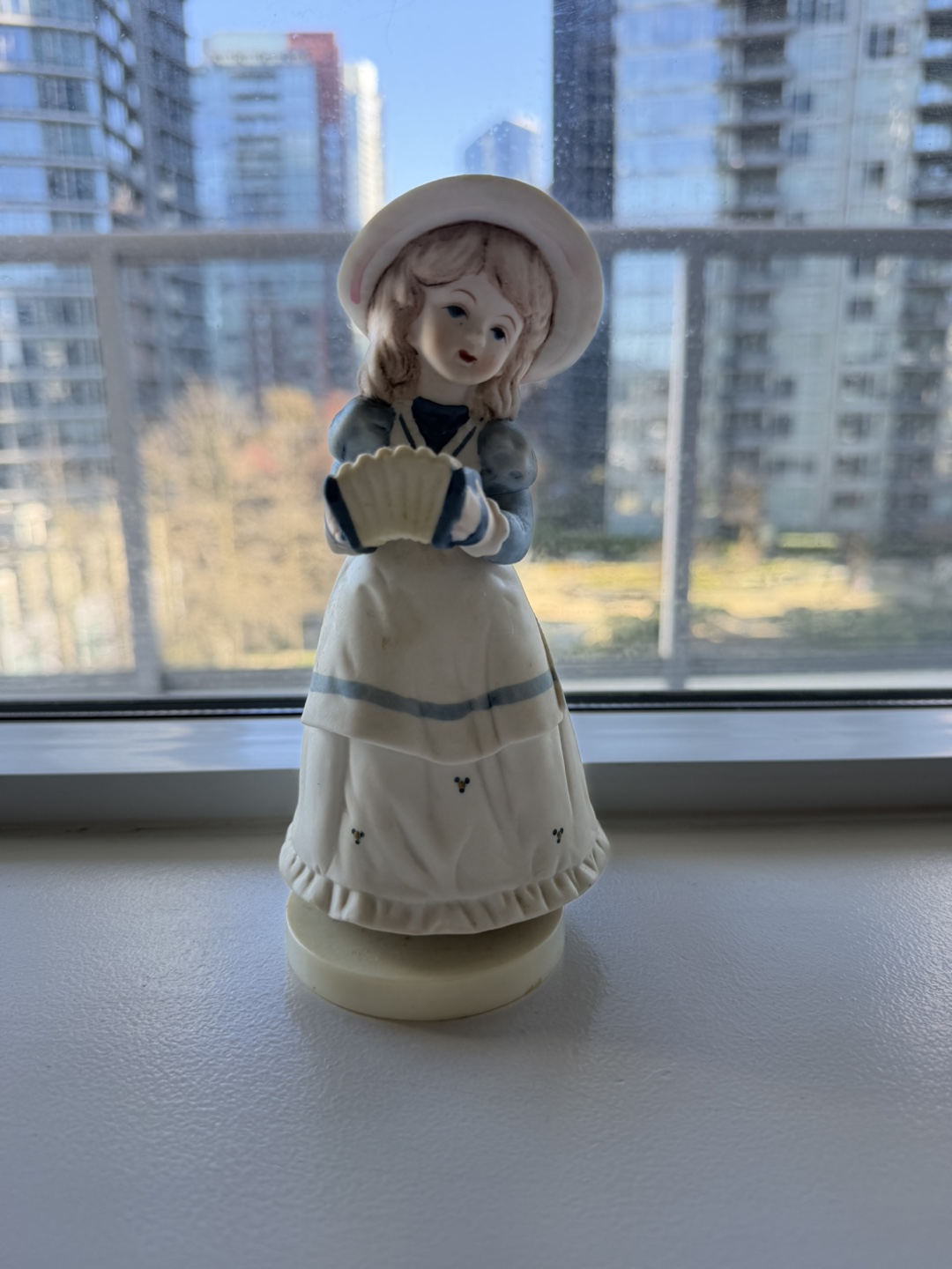 Vintage Porcelain Figurine of a Girl with Accordion