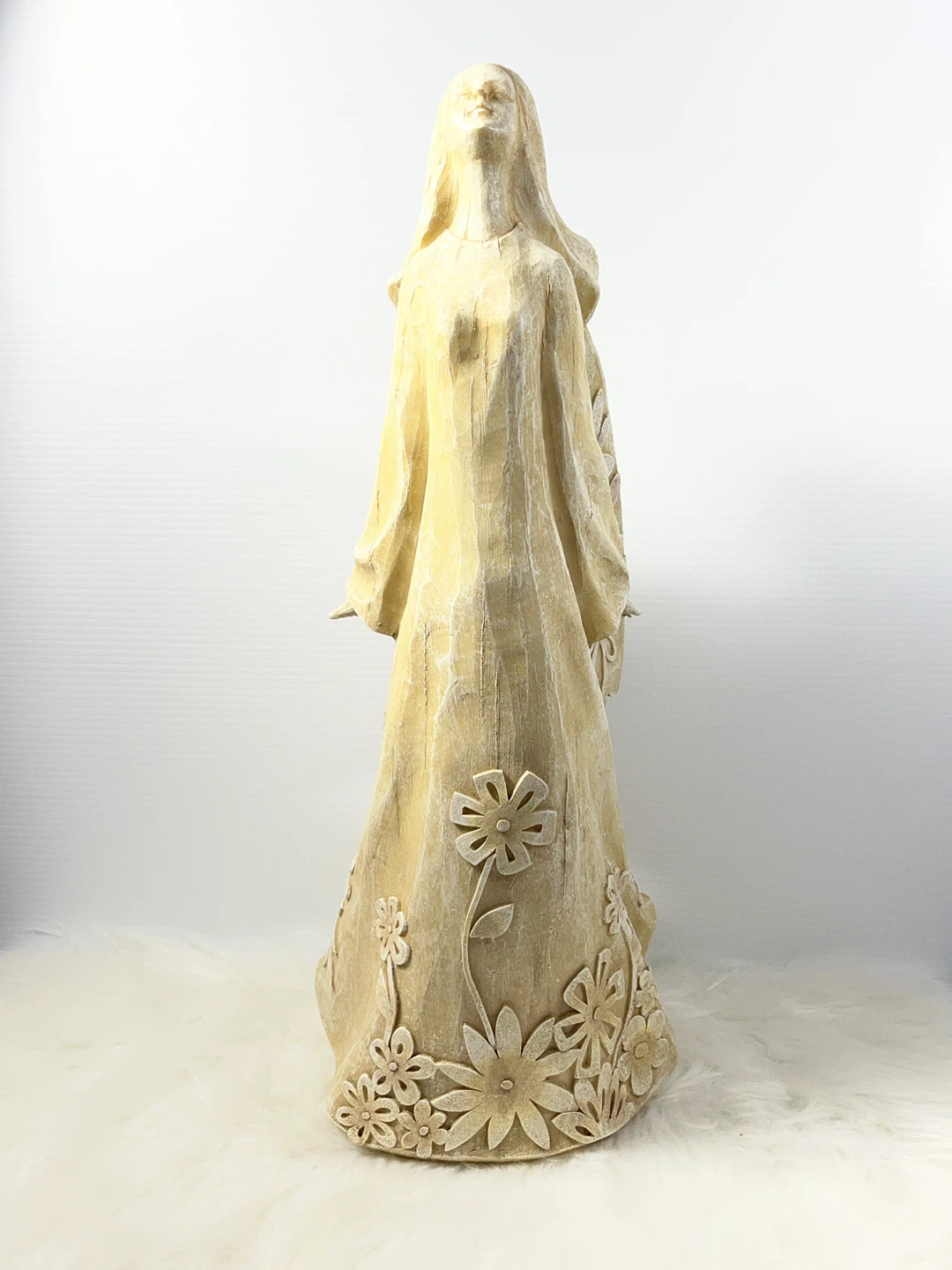 Decorative Angel Figurine with Floral Accents