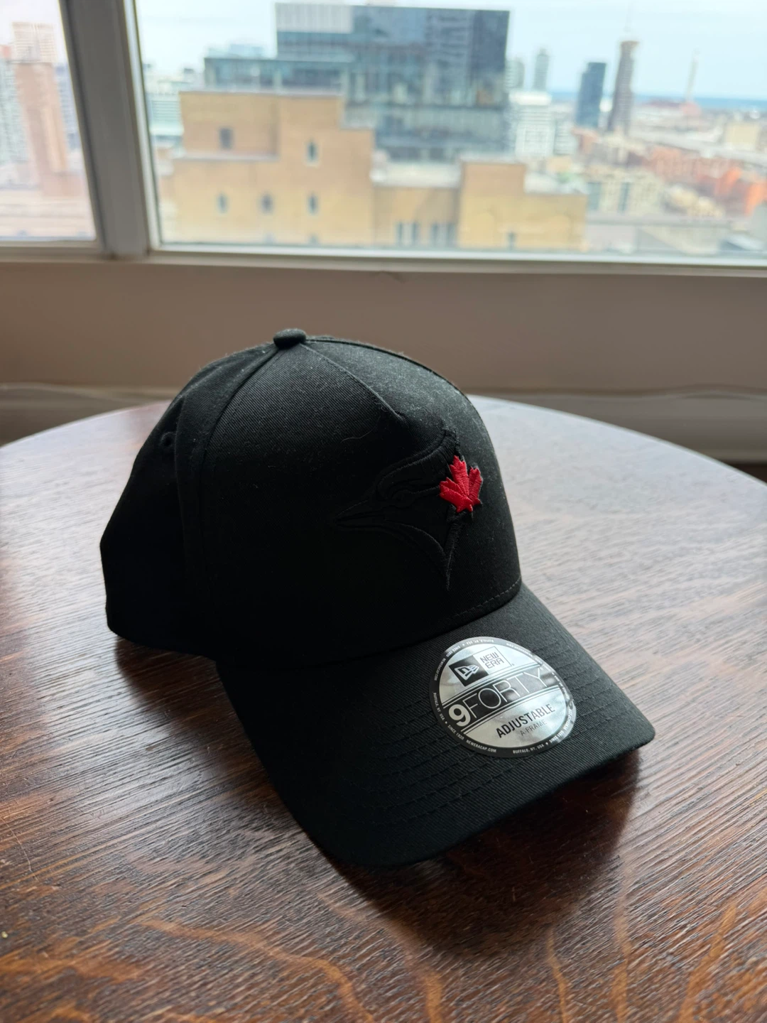 New Era 9FORTY Black Adjustable Baseball Cap with Maple Leaf