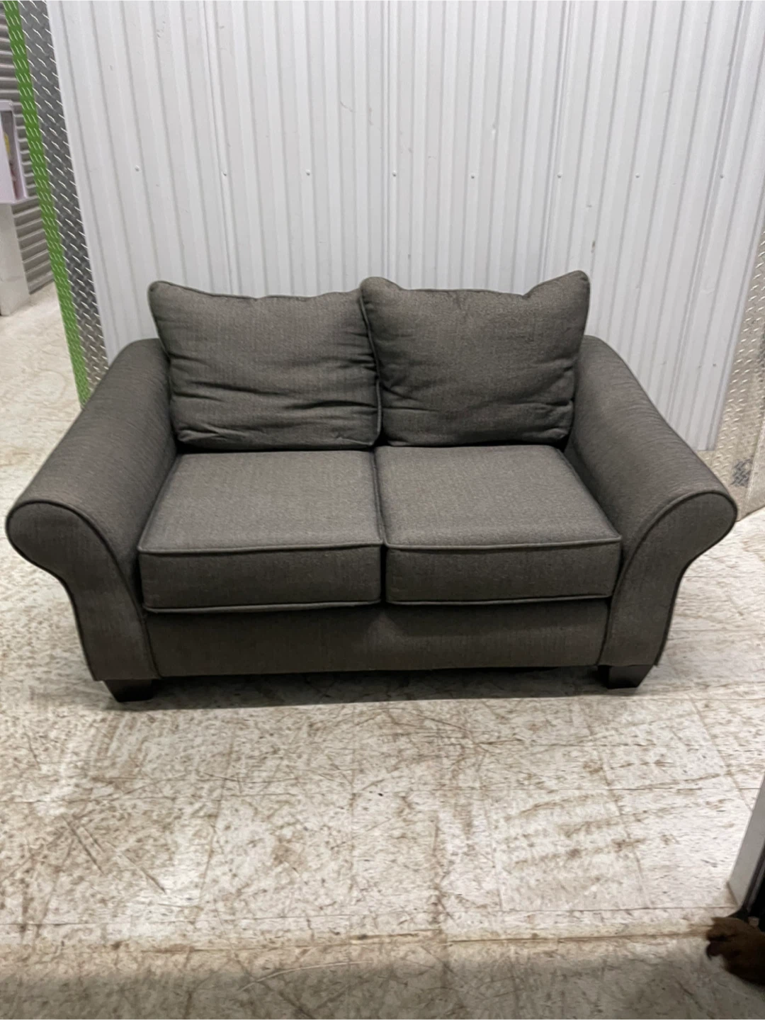 Gray Two-Seater Sofa with Accent Pillows