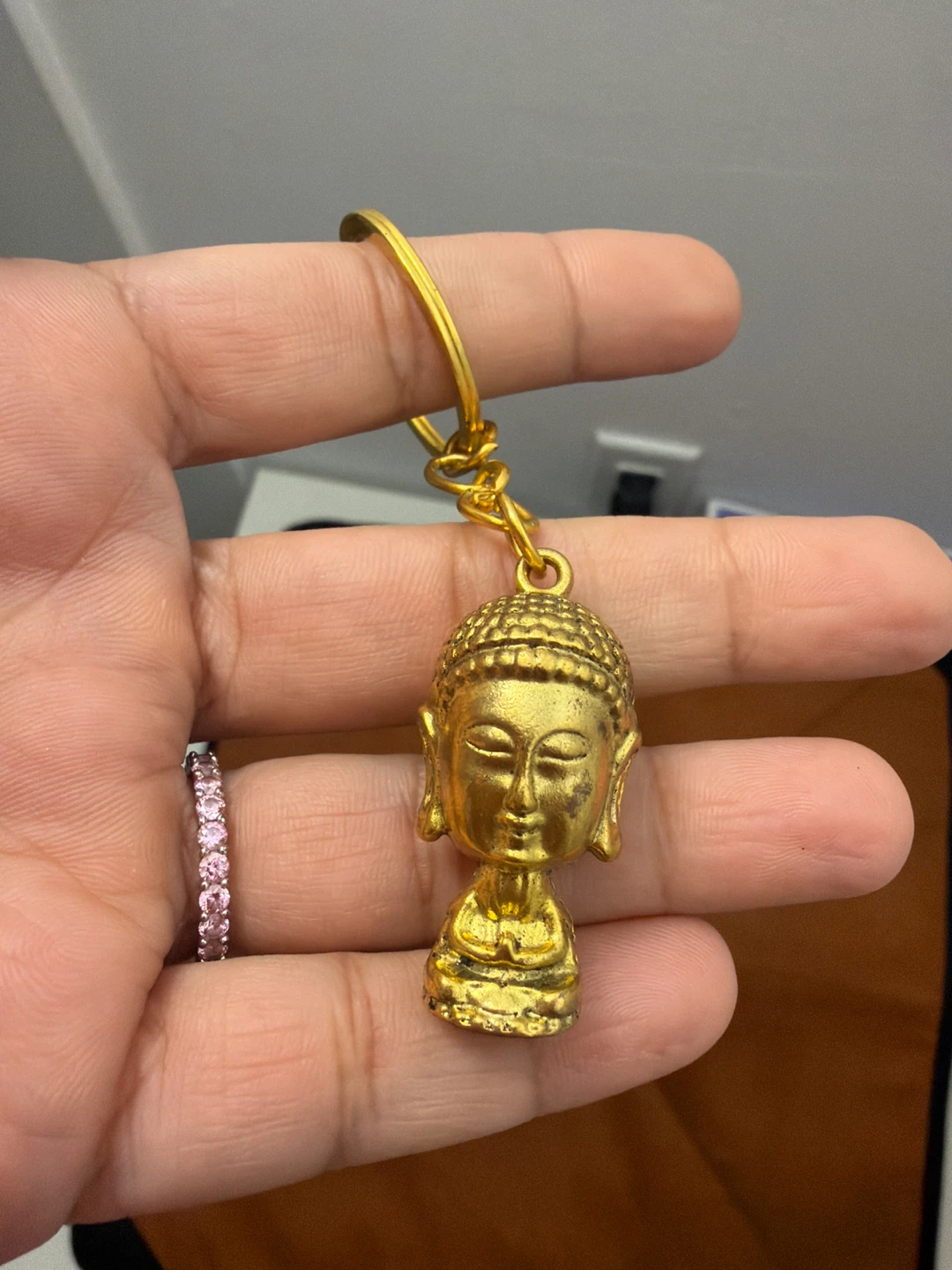 Gold coloured Buddha head keychain